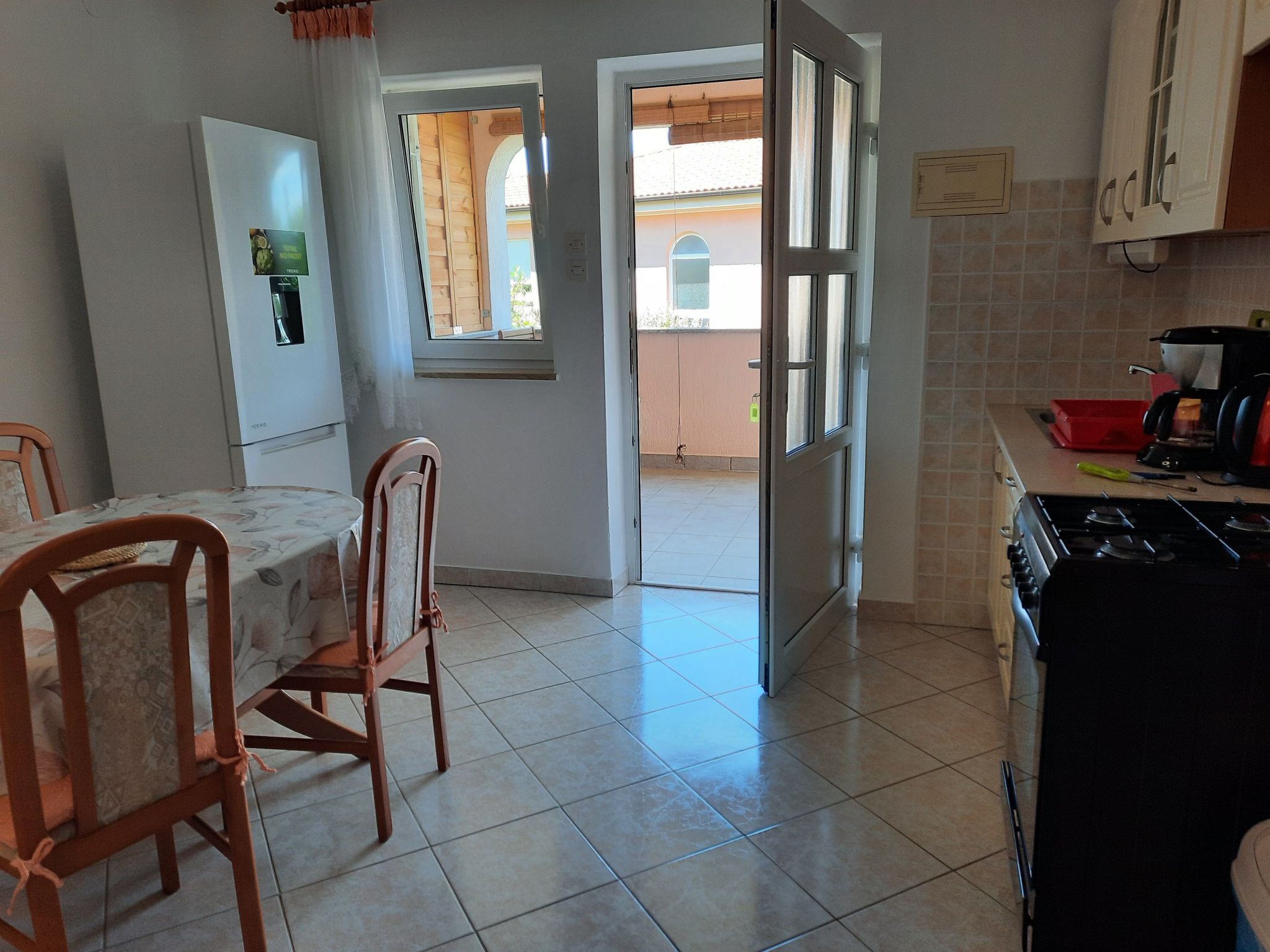 Mit privater Terrasse-Drinnen