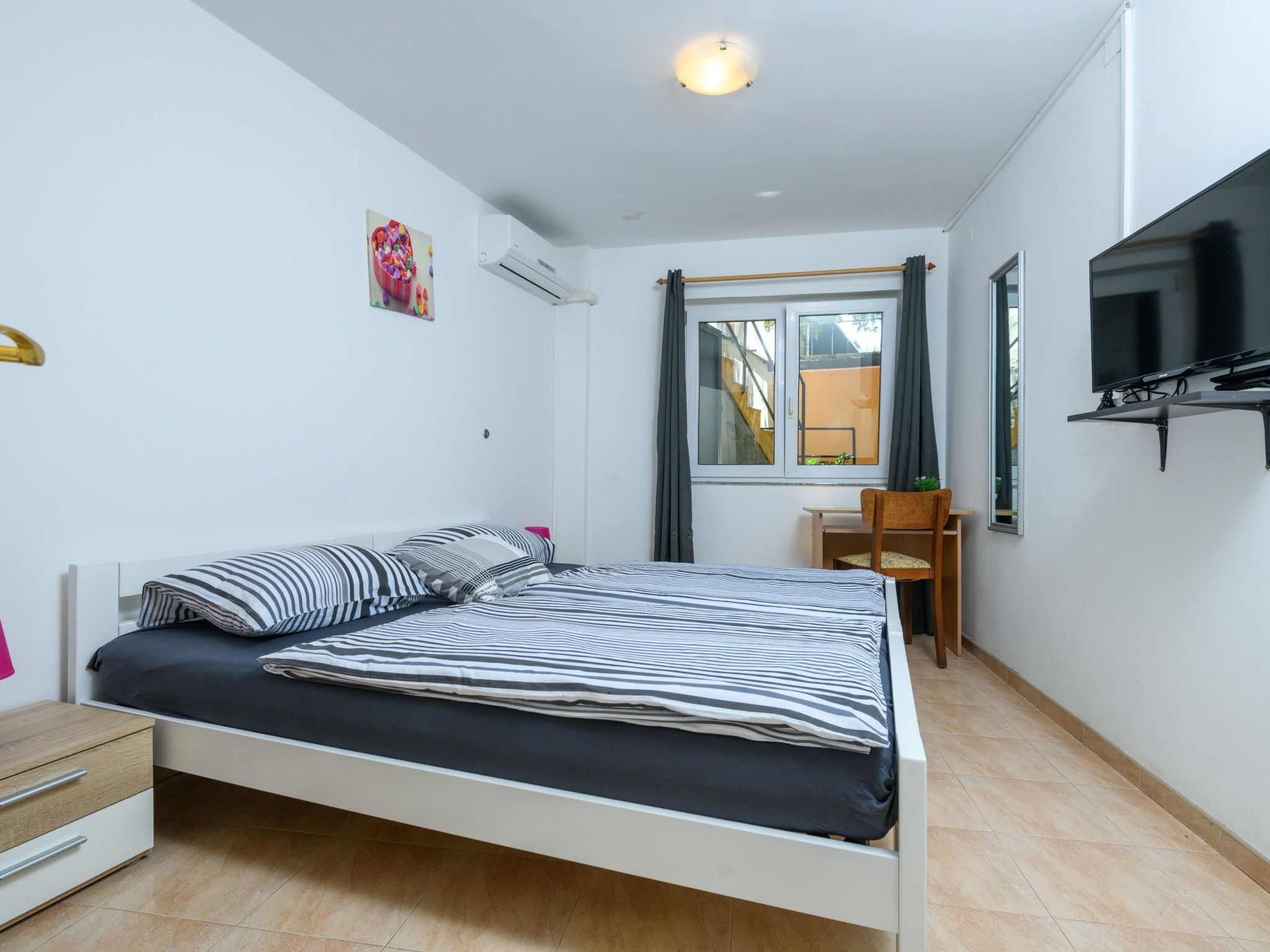 Photo of Wunderschönes Ferienhaus in Pomer mit Garten