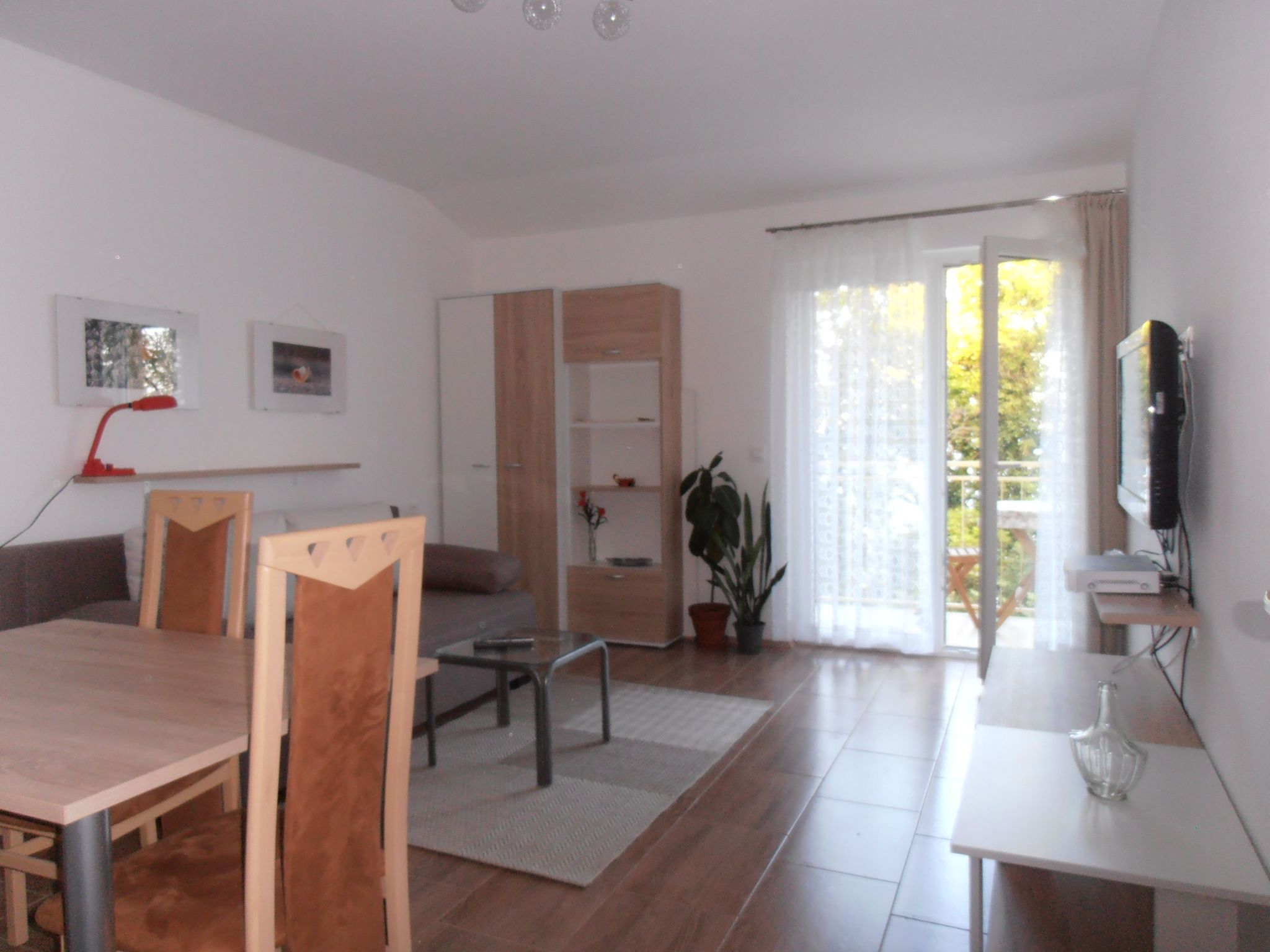 One of two modern holiday apartments, each with a private balcony, in a newly built (2015) house

The holiday apartments are located only a 5 minute walk to the seashores. There is a walking promenade..