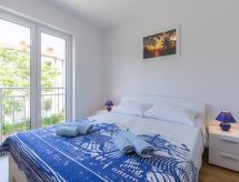 Knusse vrijstaande vakantiewoning Nino3 met balkon, 300m van zee - thumbnail 2
