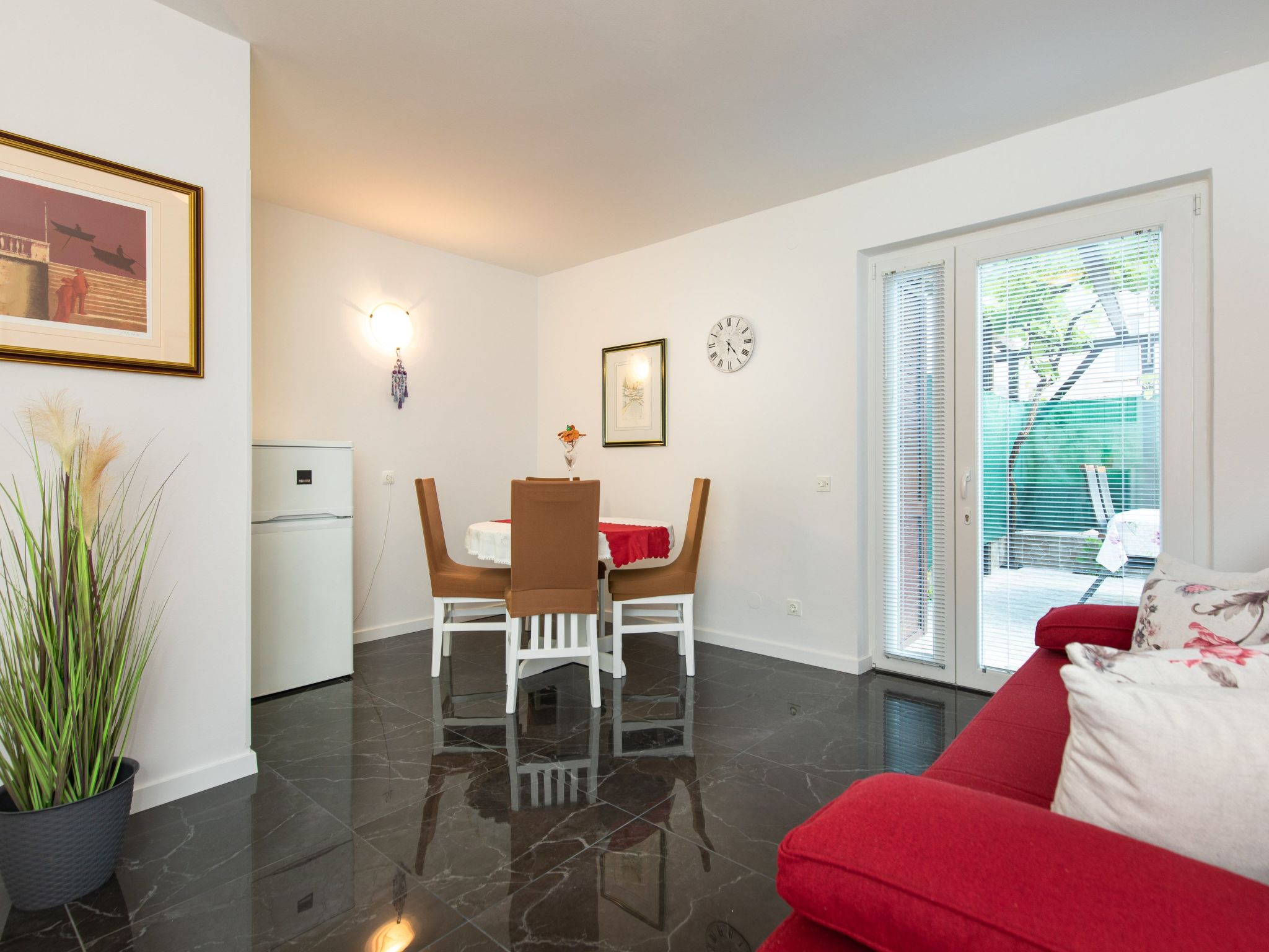 Photo of Apartment im Erdgeschoss mit überdachter Terrasse