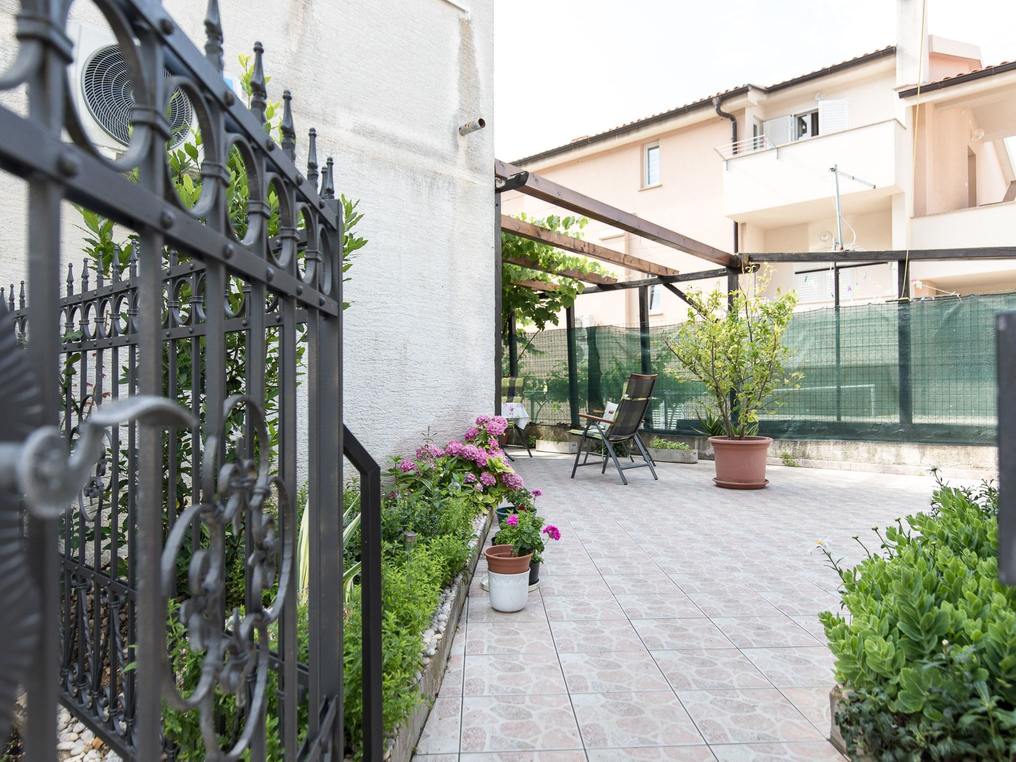 Photo of Apartment im Erdgeschoss mit überdachter Terrasse