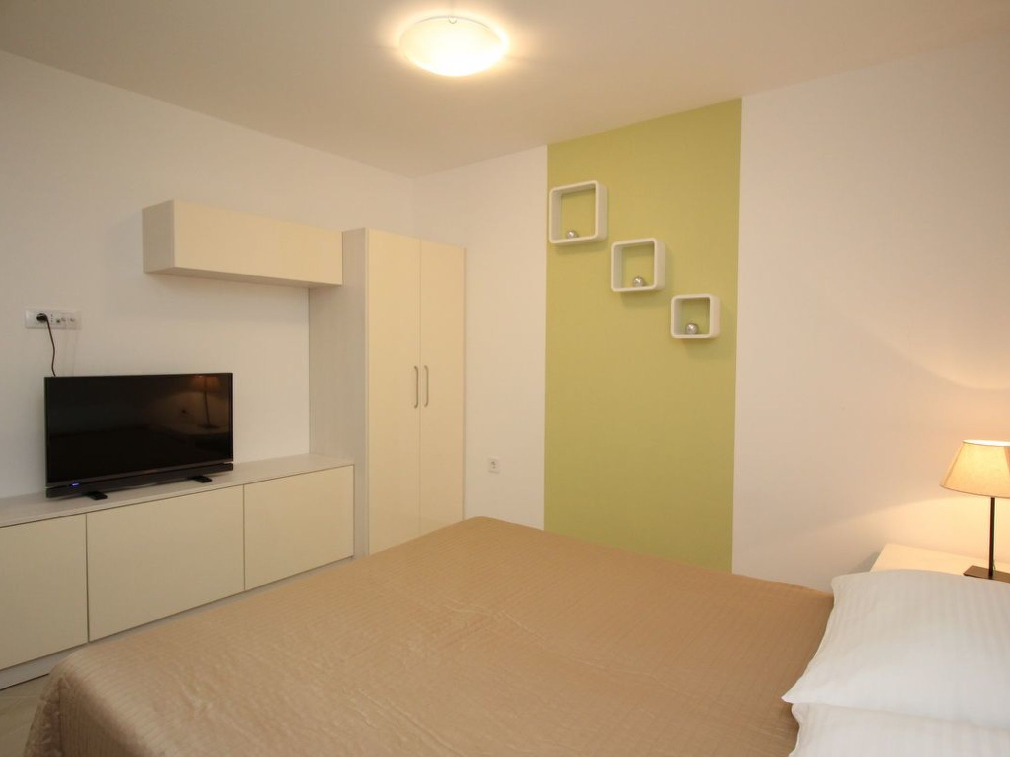 Photo of Appartement in Baška mit gemeinsamem Pool und Grill