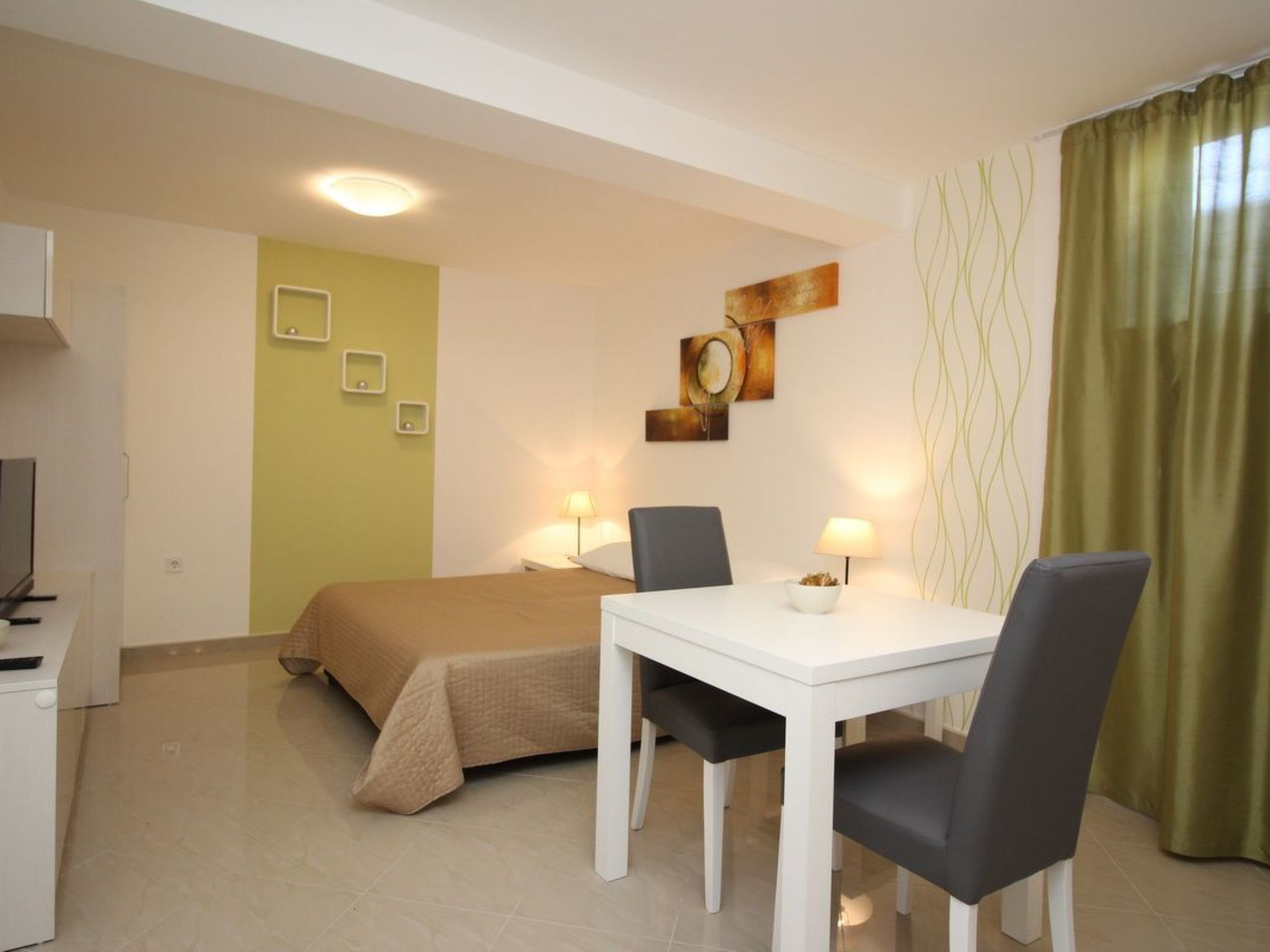 Photo of Appartement in Baška mit gemeinsamem Pool und Grill