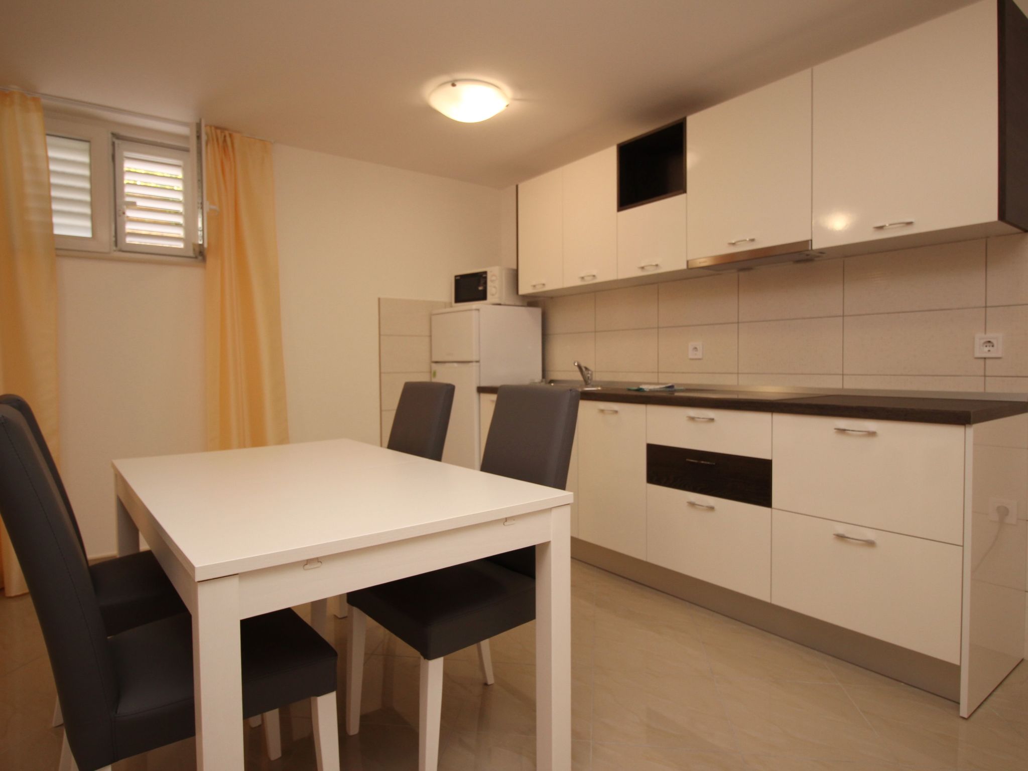 Photo of Gemütliche Ferienwohnung in Baška mit gemeinsamem Pool und Grill