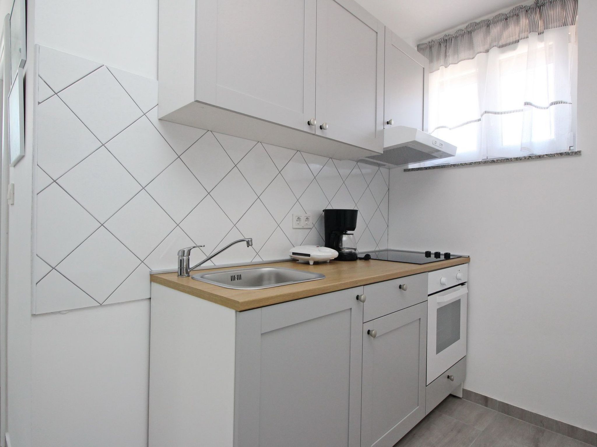 Wohnung in Baška mit Terrasse