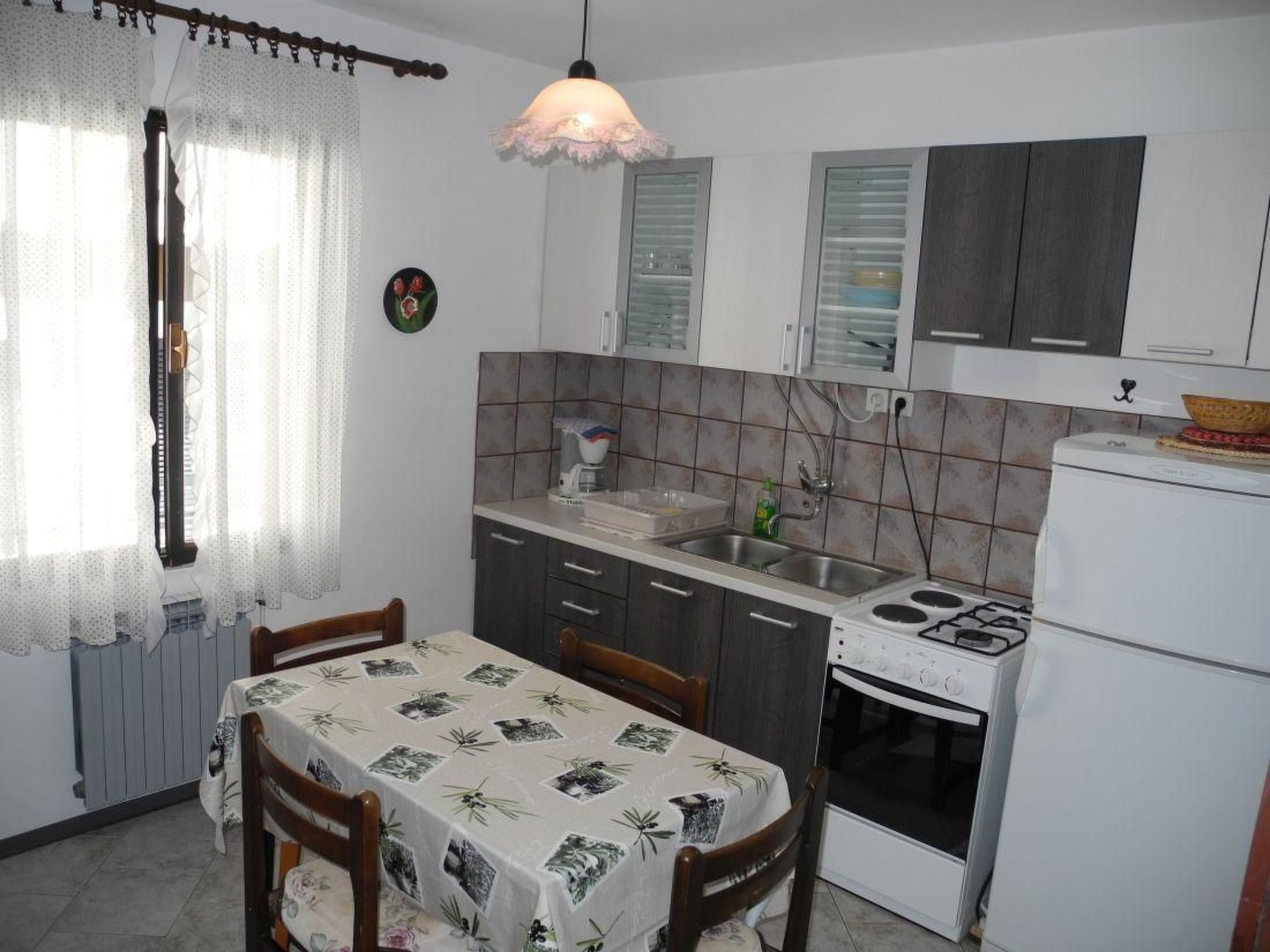 Appartement mit Balkon und Meerblick-Dedans