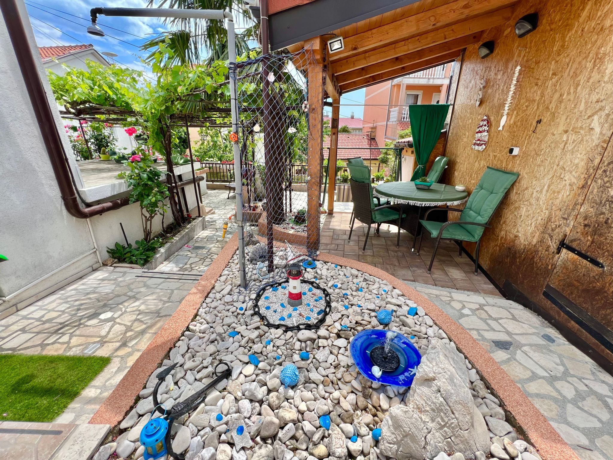 Photo of mit eigenem Garten und Grill