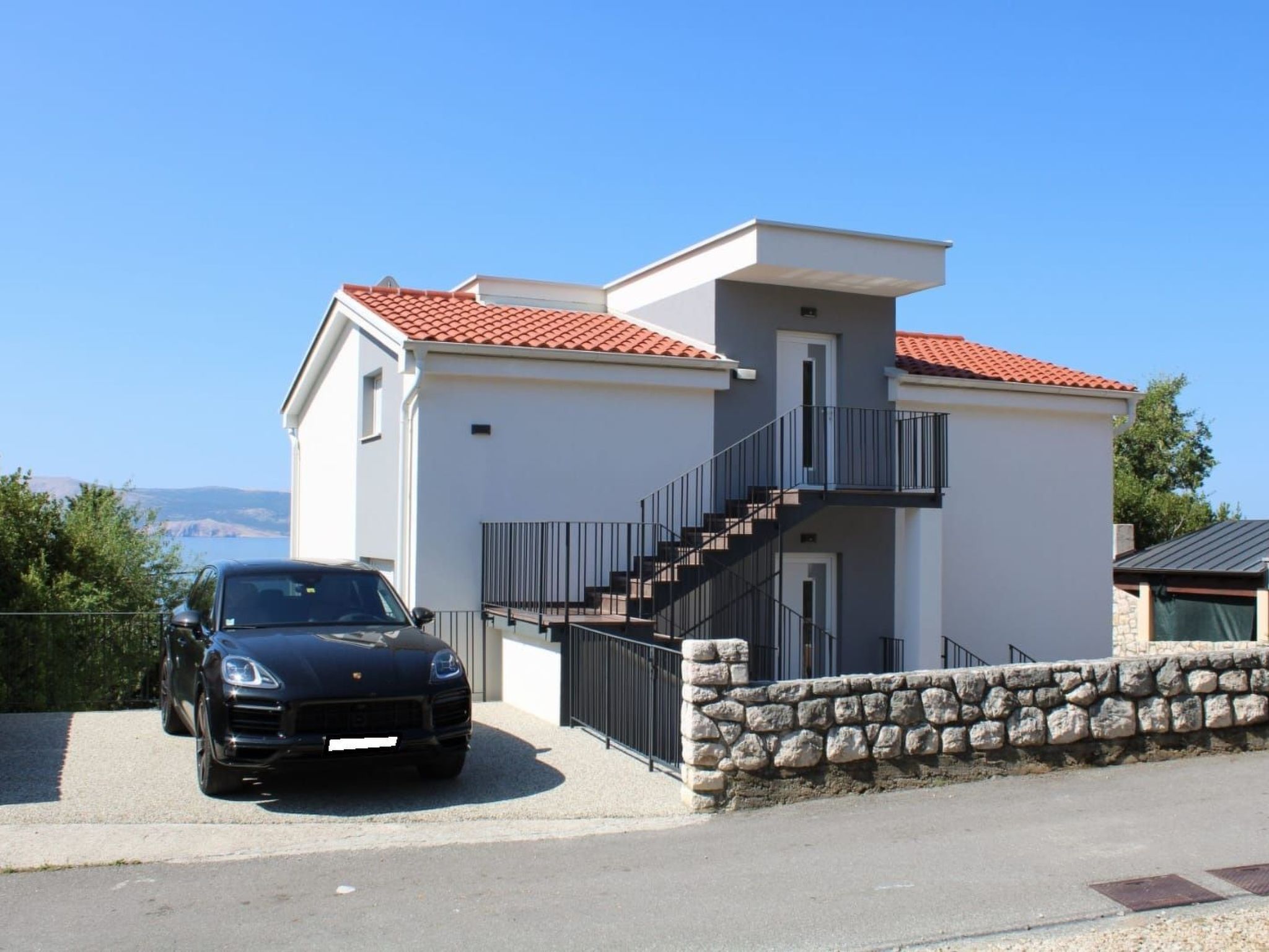 Appartement mit Terrasse, Meerblick, Jacuzzi, Außenpool-Binnen