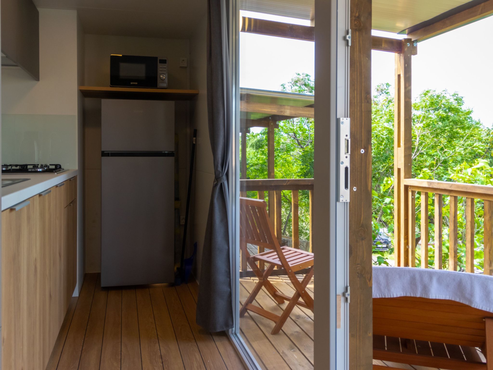 Mobilheim mit gemeinschaftlichem Pool-Dedans