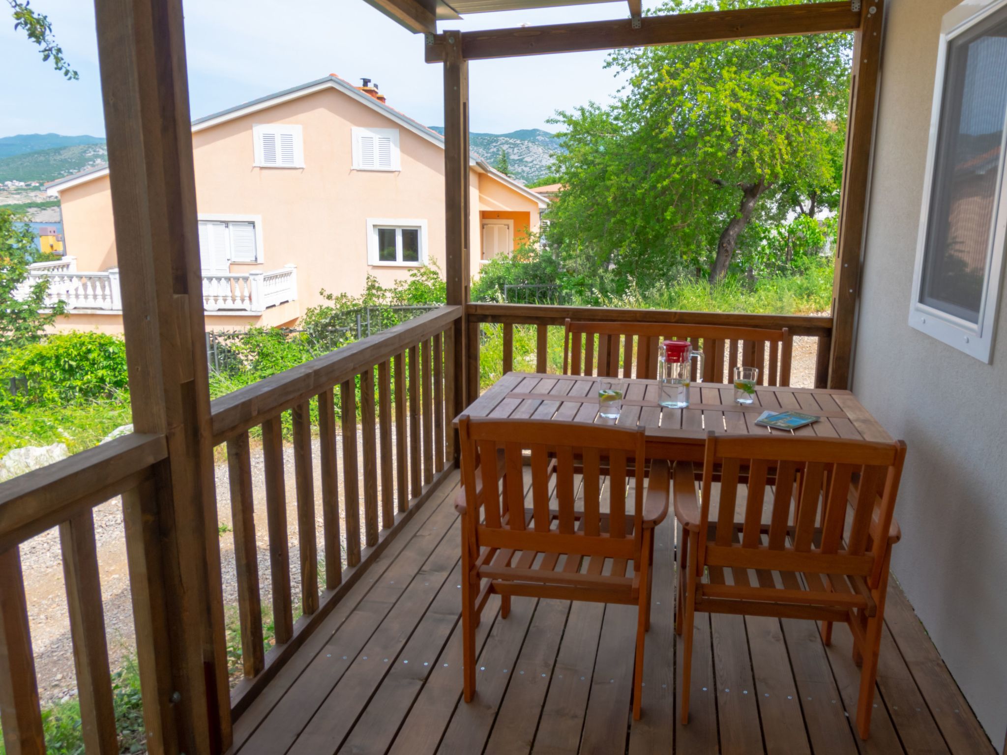 Mobilheim mit gemeinschaftlichem Pool-Dedans