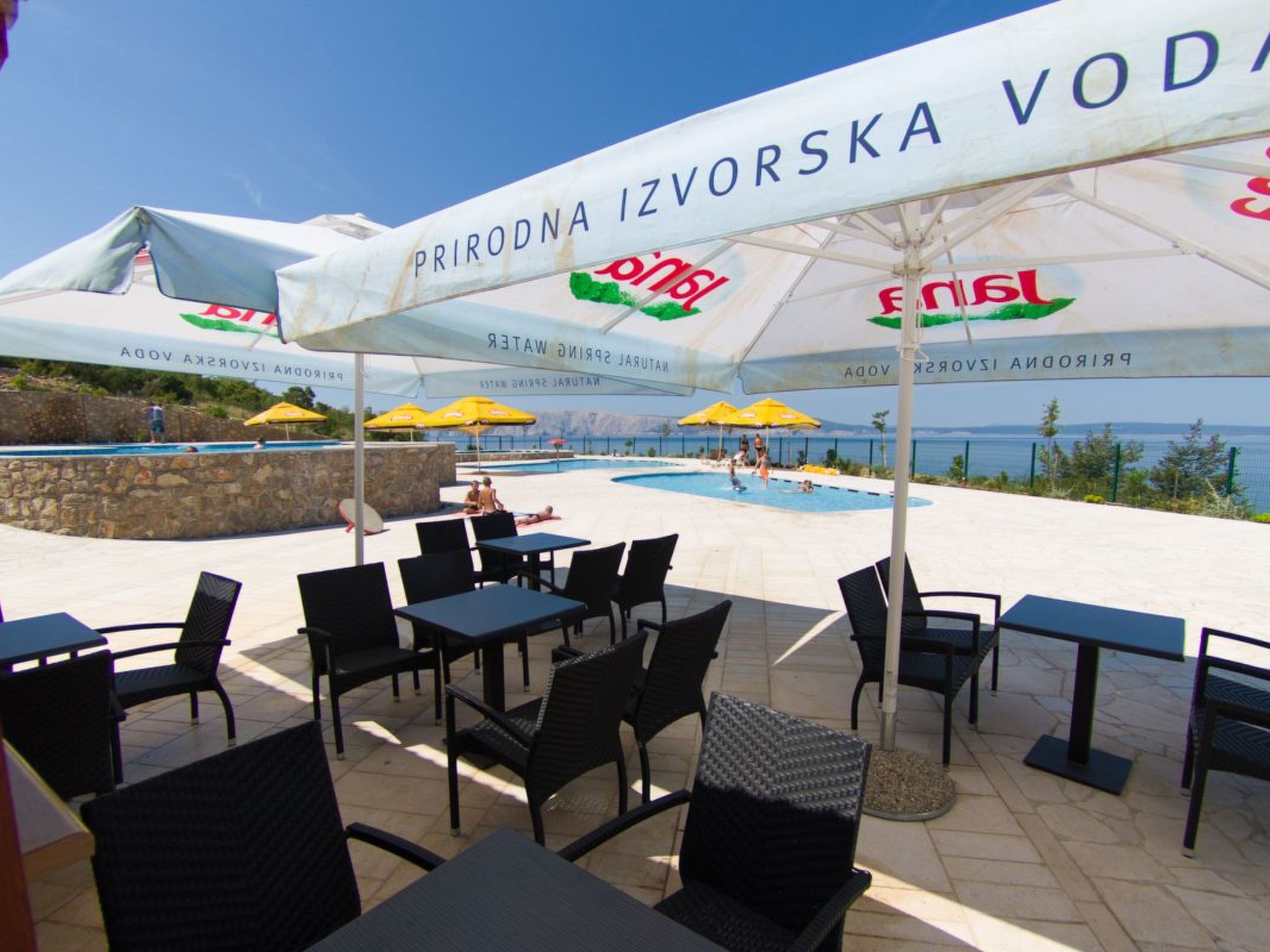 Mobilheim mit gemeinschaftlichem Pool-Dedans