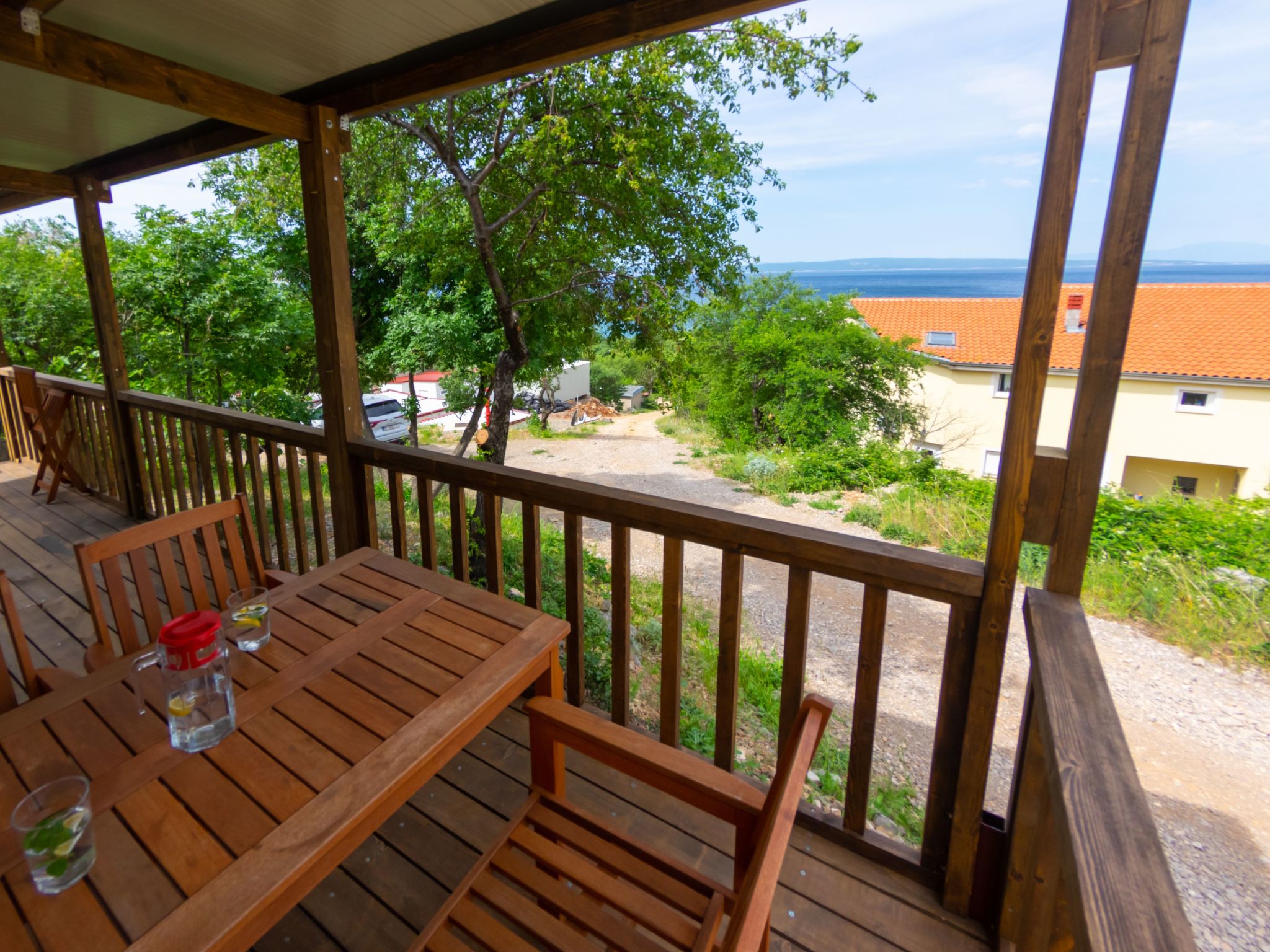 Mobilheim mit gemeinschaftlichem Pool-Dedans