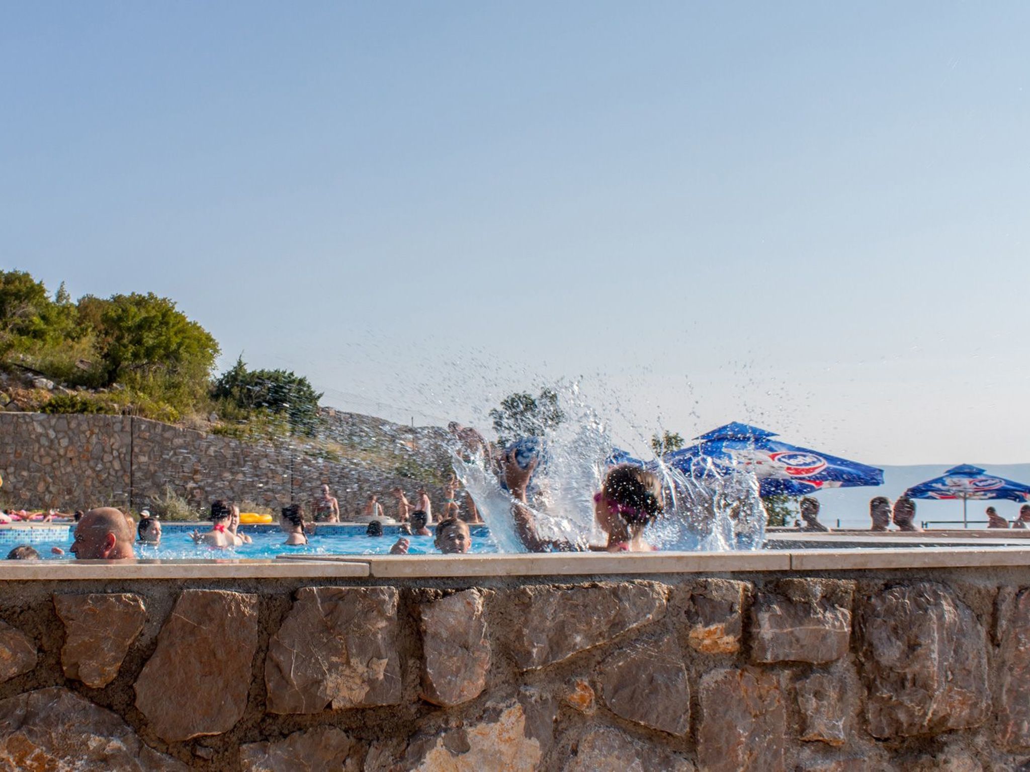 Mobilheim mit gemeinschaftlichem Pool-Dedans