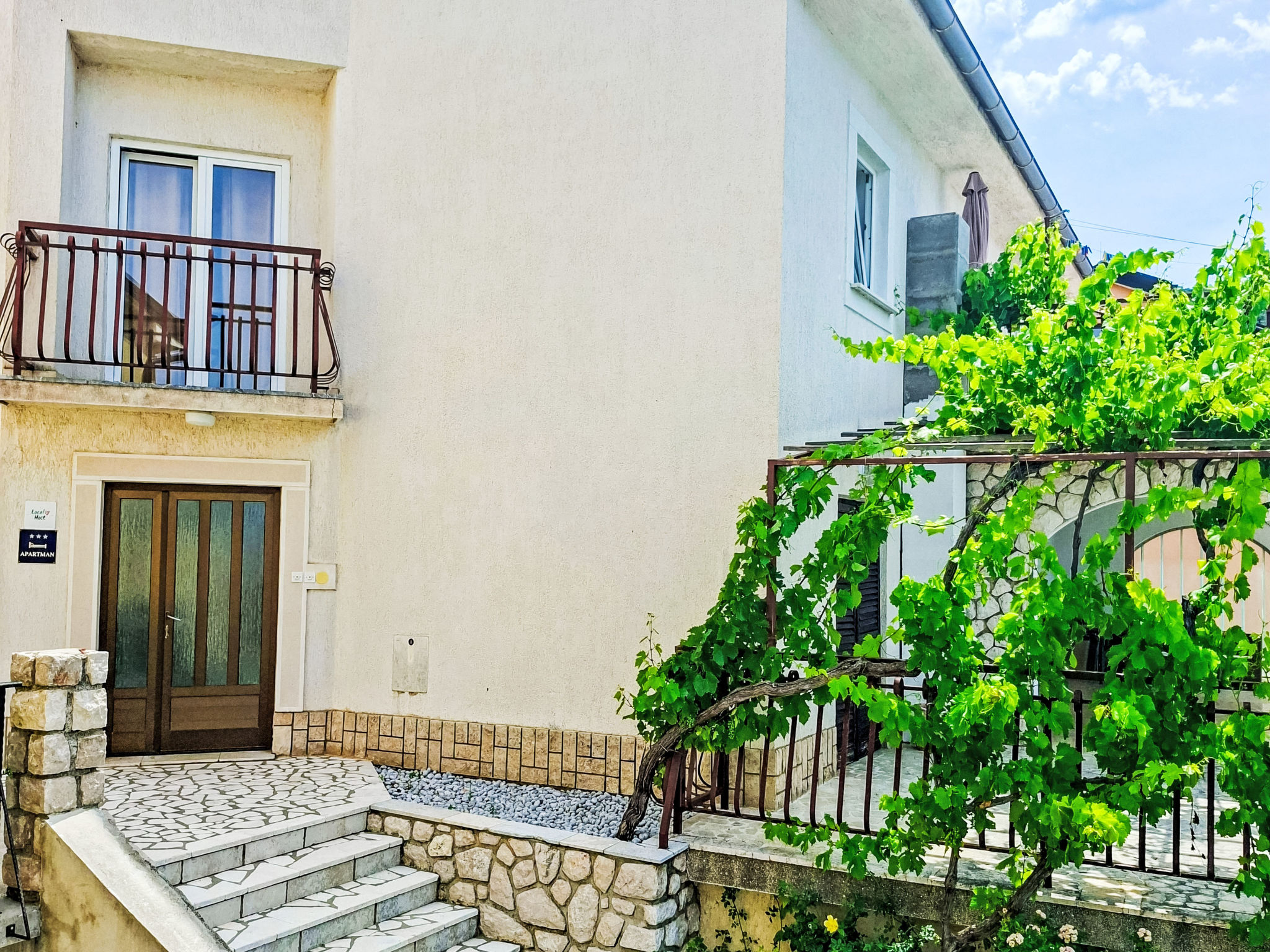 Gesamte Wohnung mit Terrasse und Meerblick - Buiten