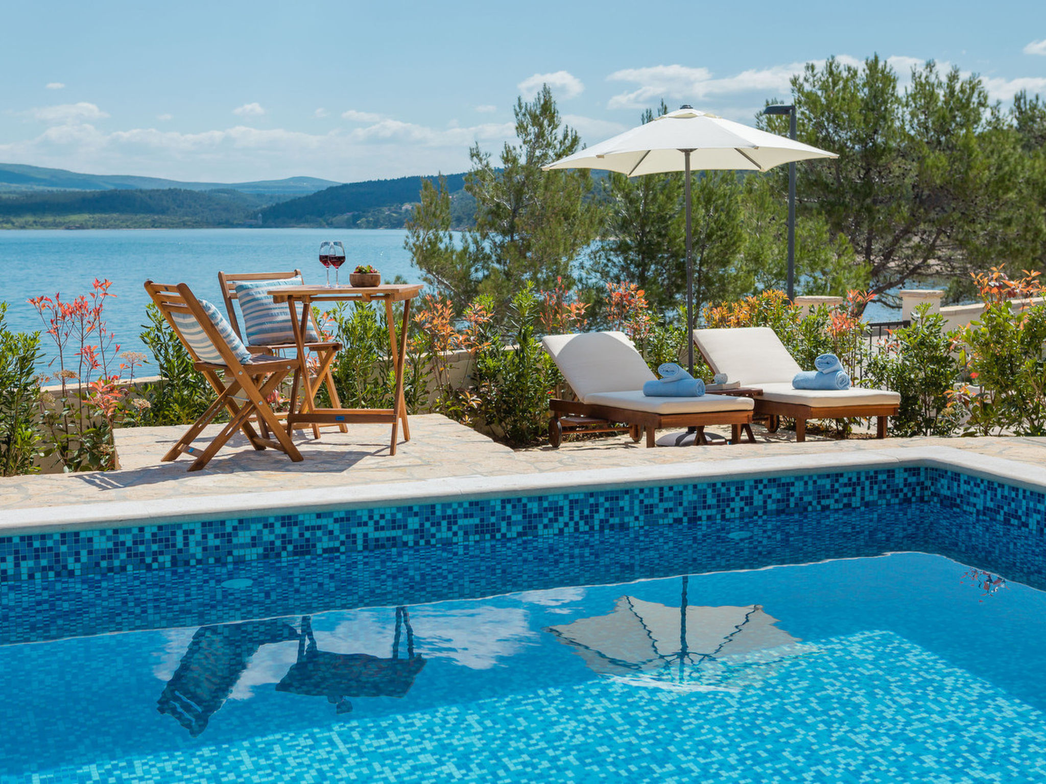 Beachfront villa Noa with heated pool