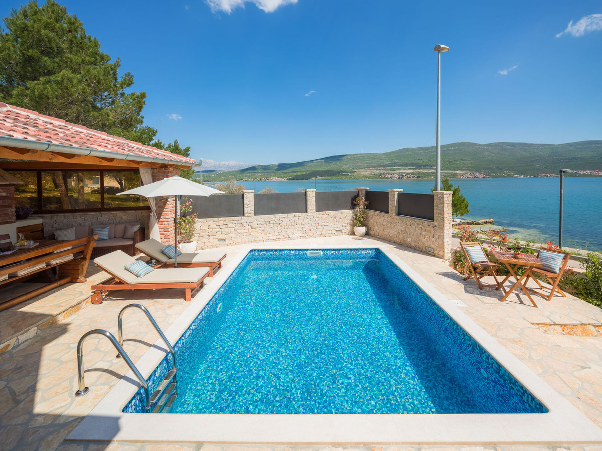 Beachfront villa Noa with heated pool