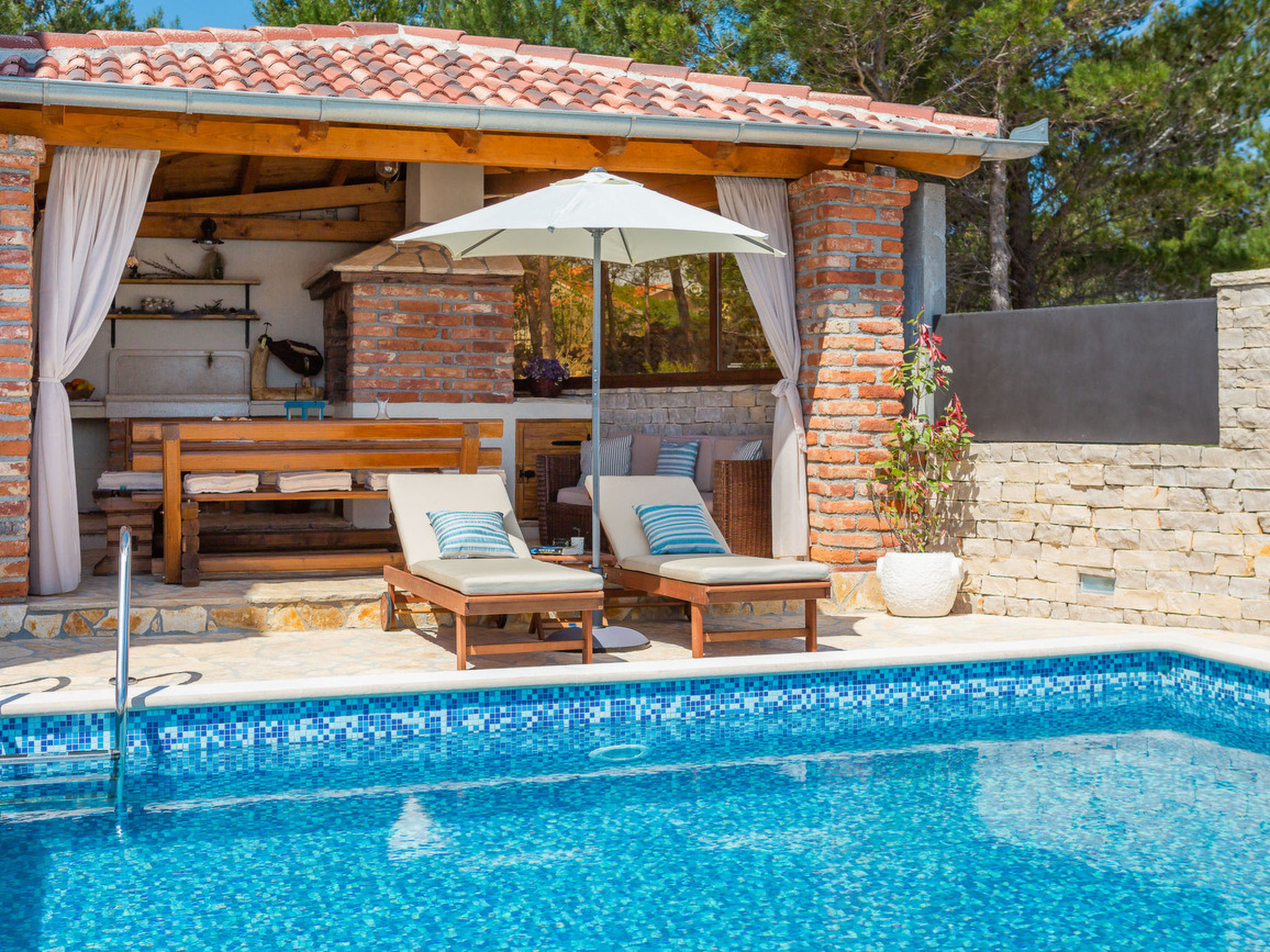 Beachfront villa Noa with heated pool