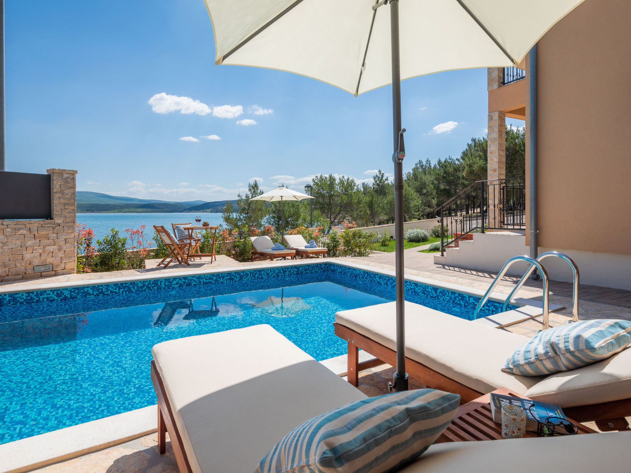 Beachfront villa Noa with heated pool