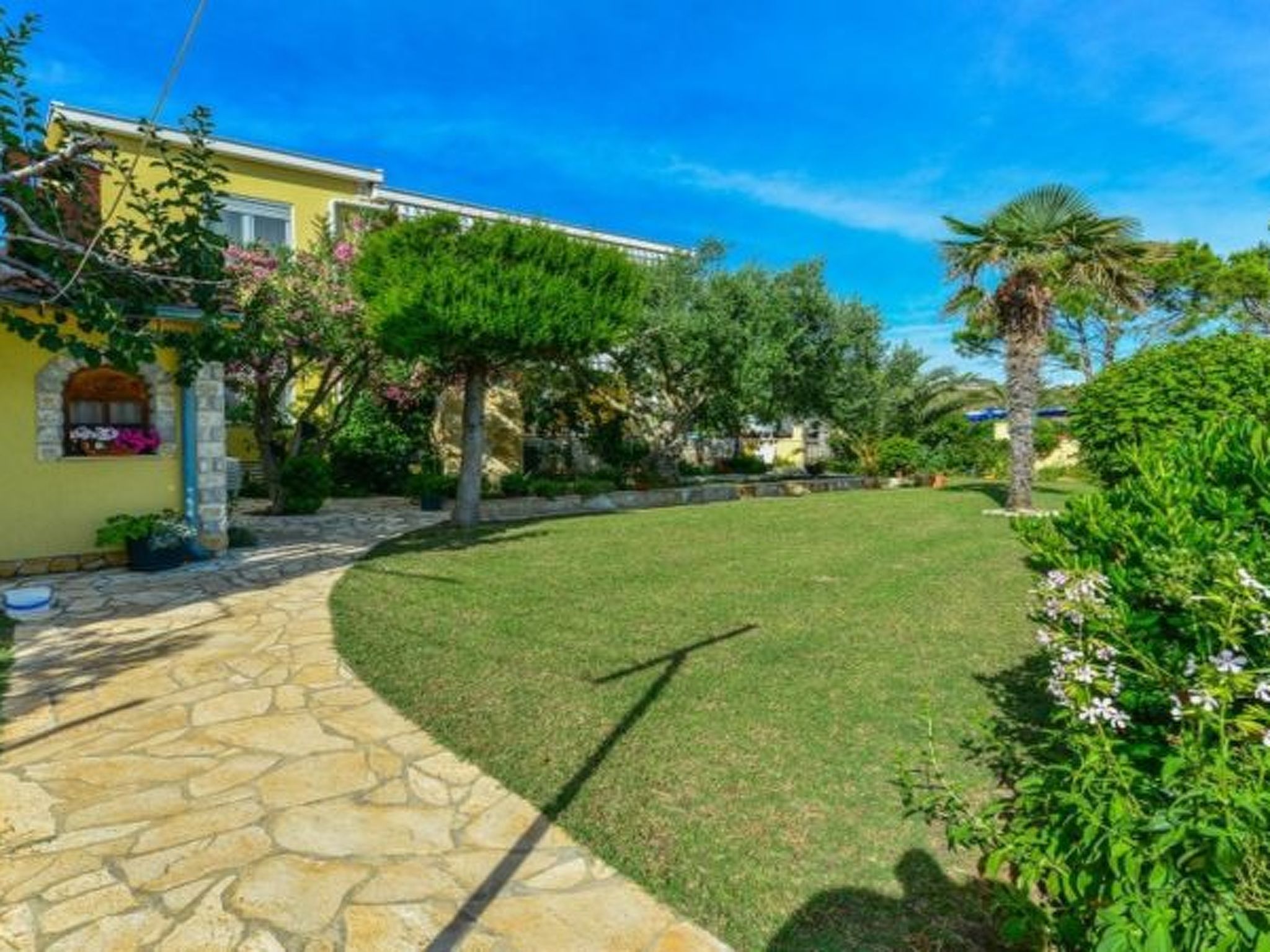 Photo of Holiday Apartment Inga Yellow with a sea view