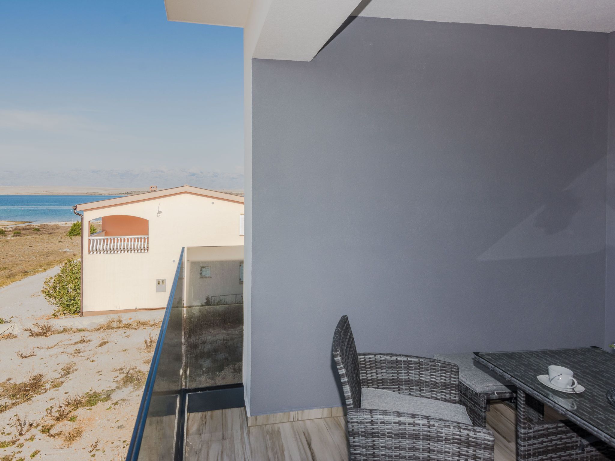 Photo of Wohnung mit Meerblick Glamour Vir - Agentur TA Leut