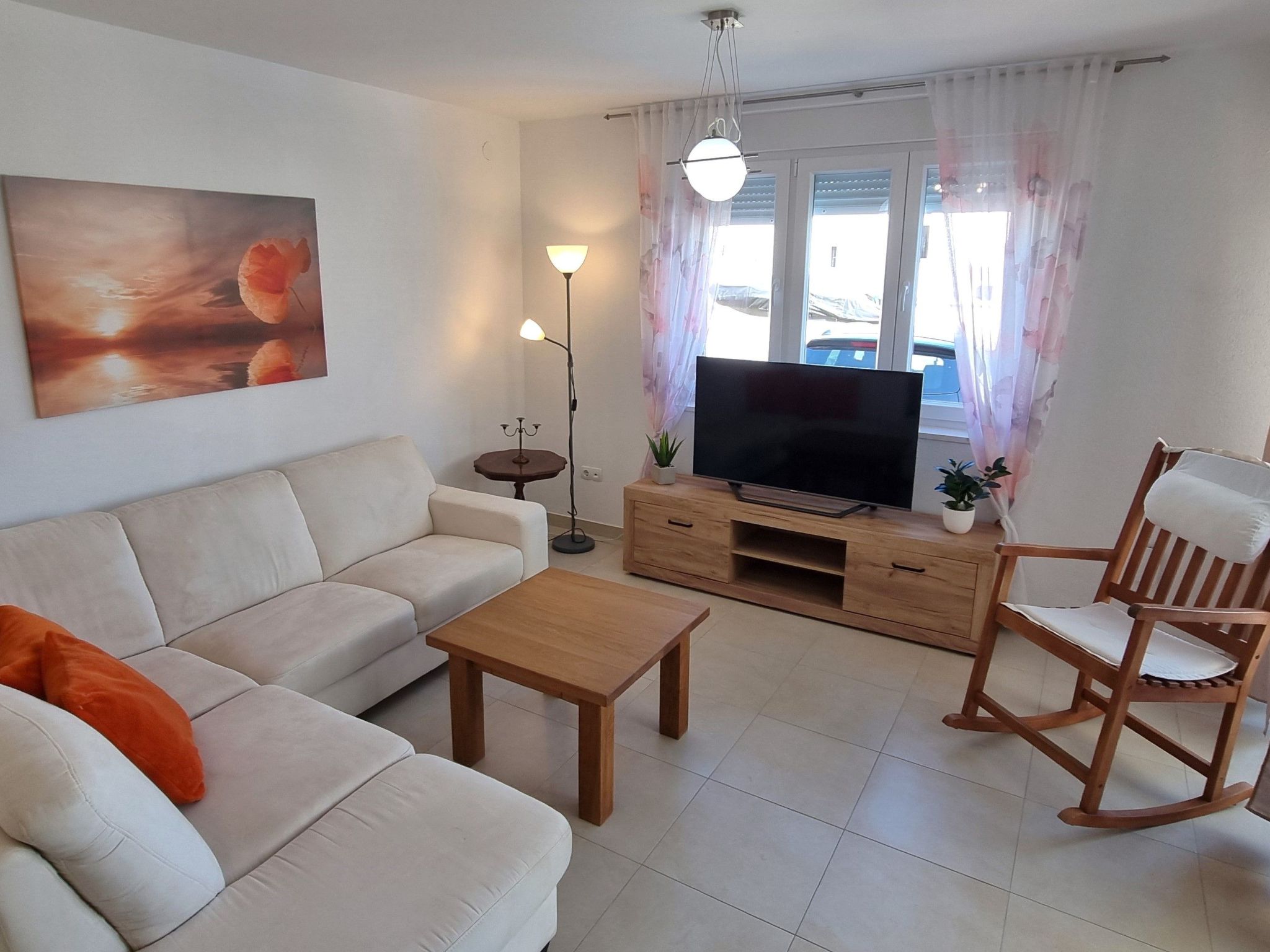 Erdgeschoss-Ferienwohnung mit Garten und Pool-Dedans