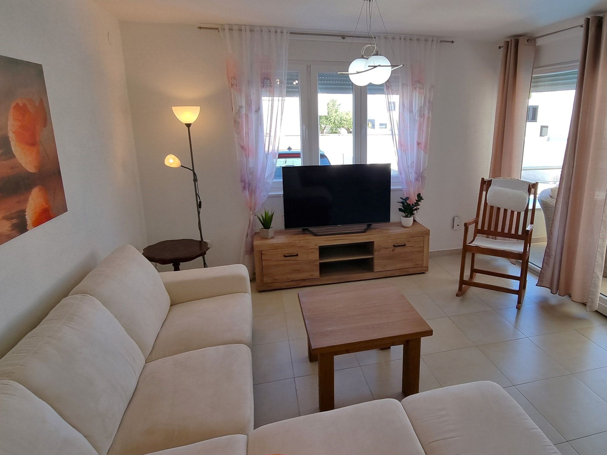 Erdgeschoss-Ferienwohnung mit Garten und Pool-Dedans