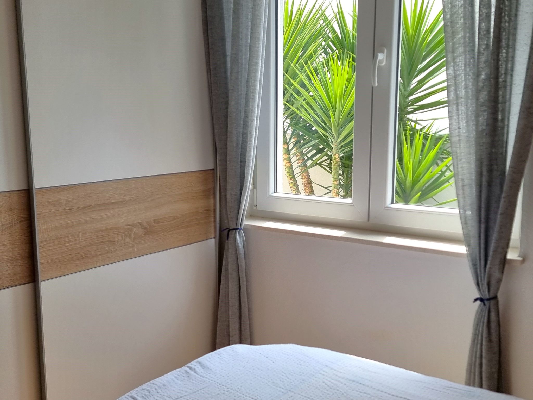 Erdgeschoss-Ferienwohnung mit Garten und Pool-Dedans