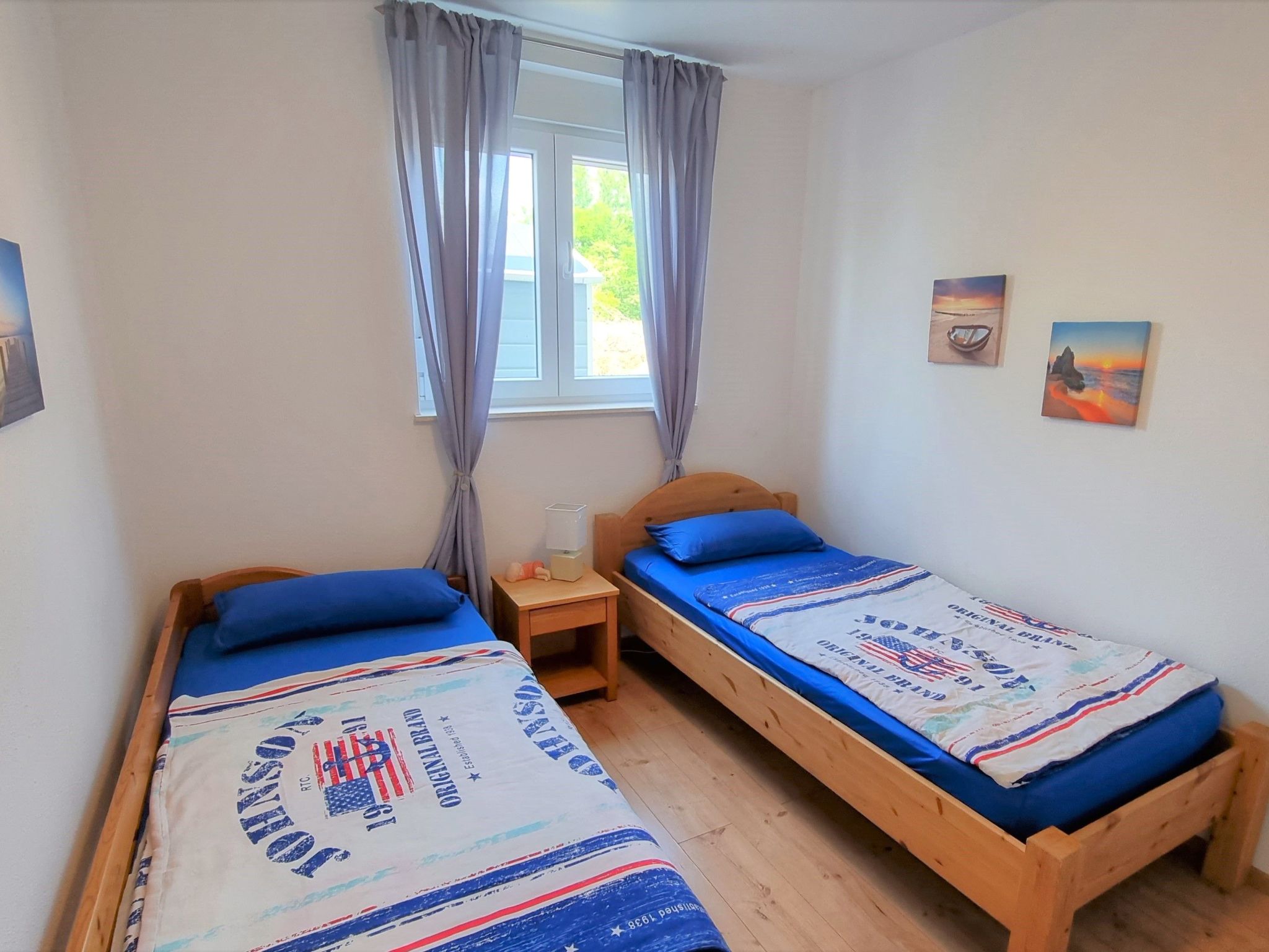 Erdgeschoss-Ferienwohnung mit Garten und Pool-Dedans