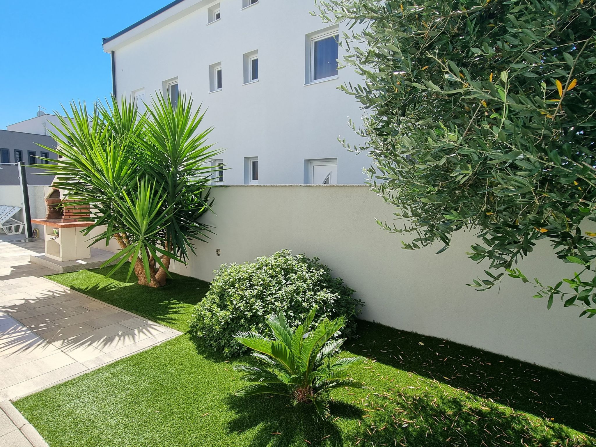 Erdgeschoss-Ferienwohnung mit Garten und Pool-Dedans