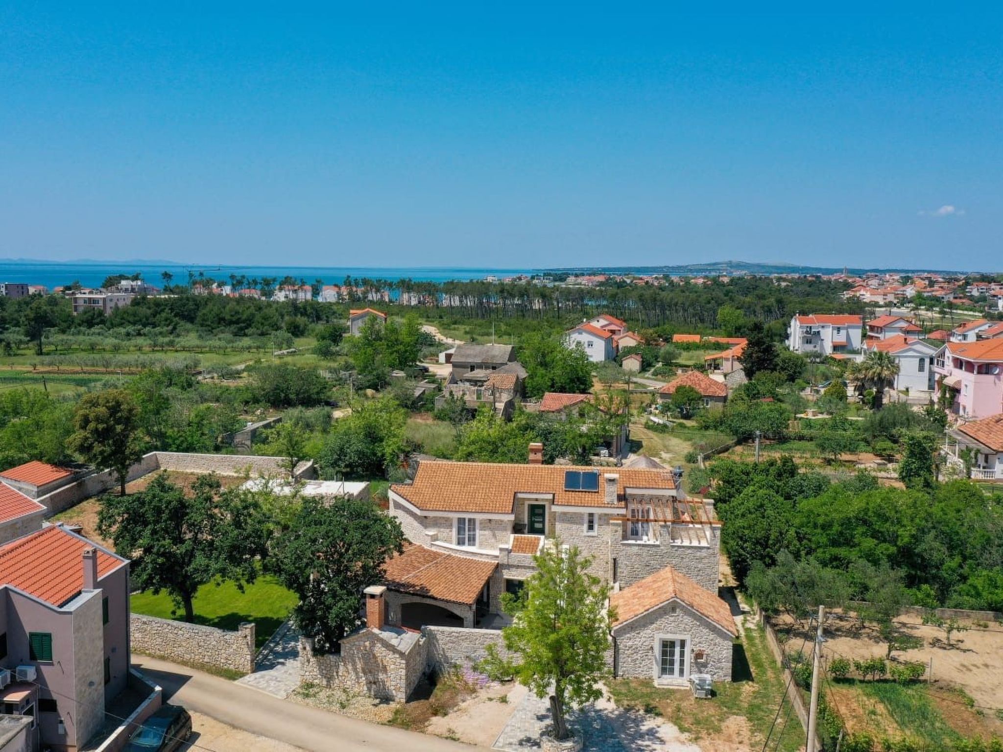 Zimmer "Graues Zimmer" mit privatem Balkon - Buiten