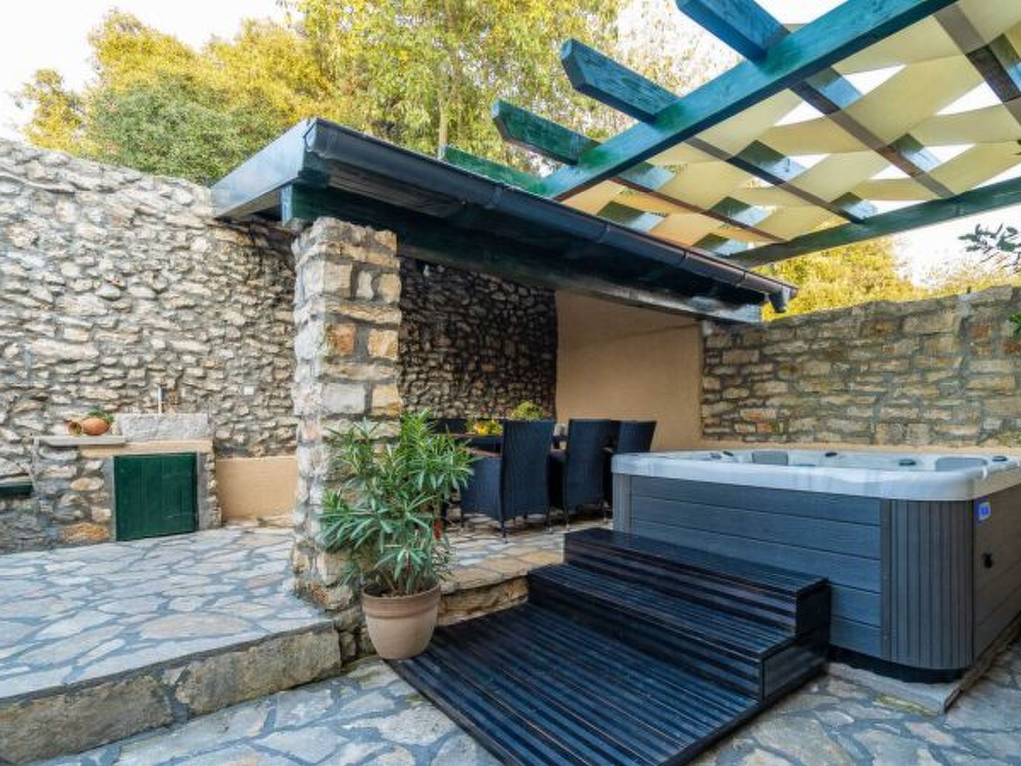 Photo of Stone Holiday house Zara with jacuzzi