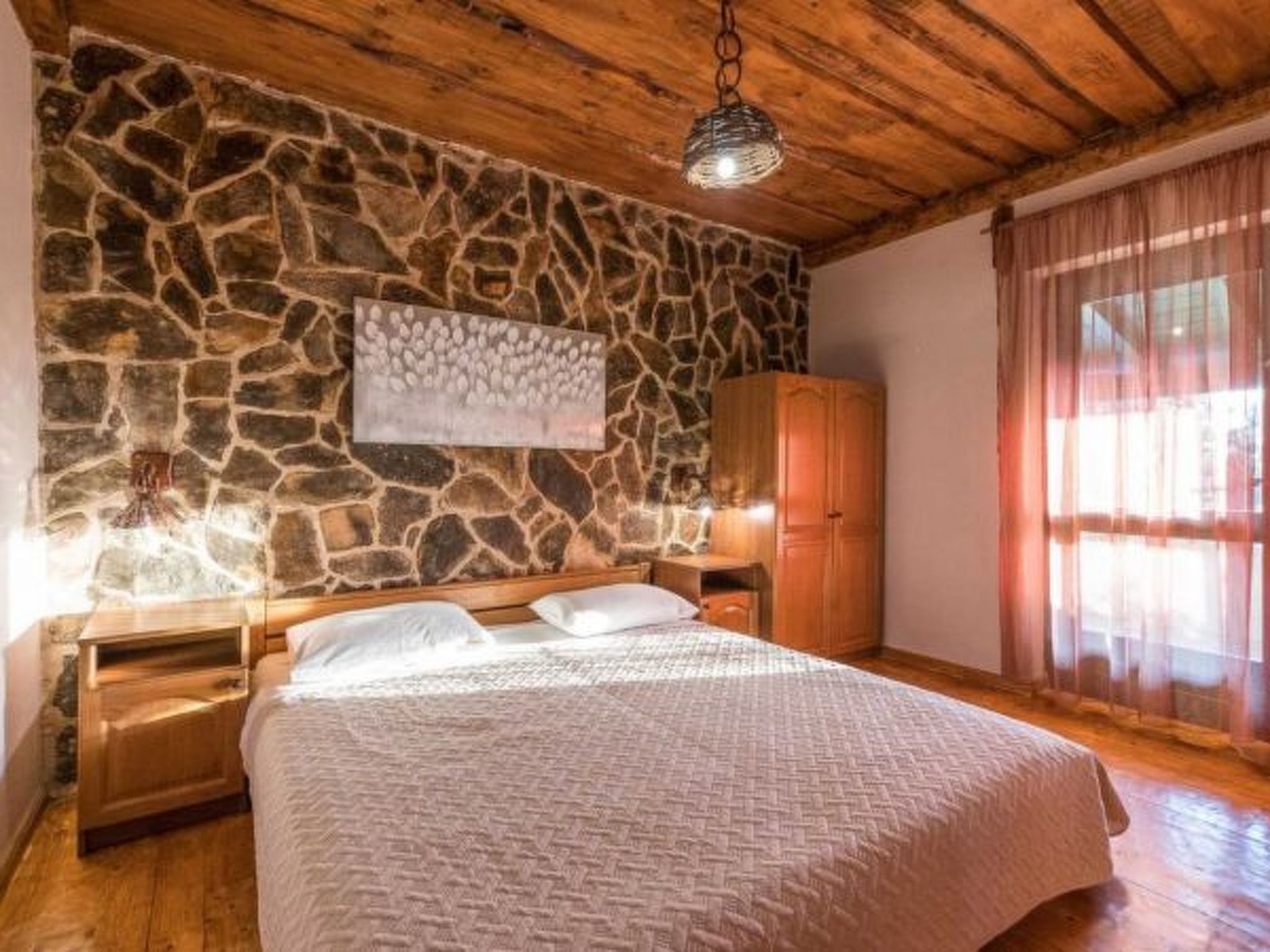 Photo of Stone Holiday house Zara with jacuzzi