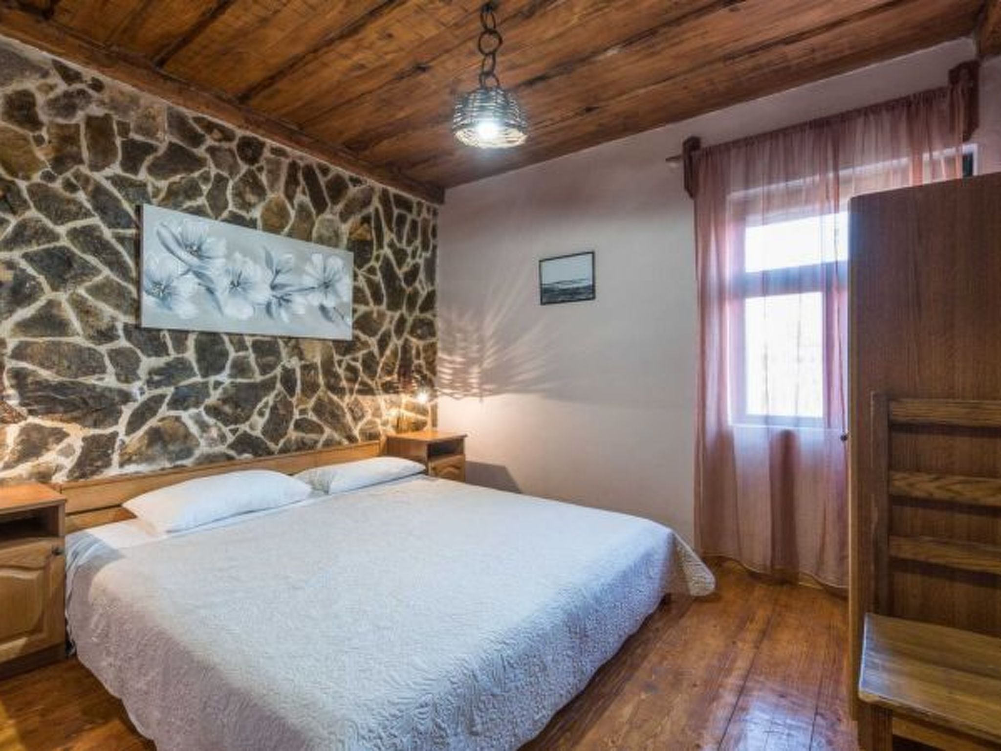 Photo of Stone Holiday house Zara with jacuzzi