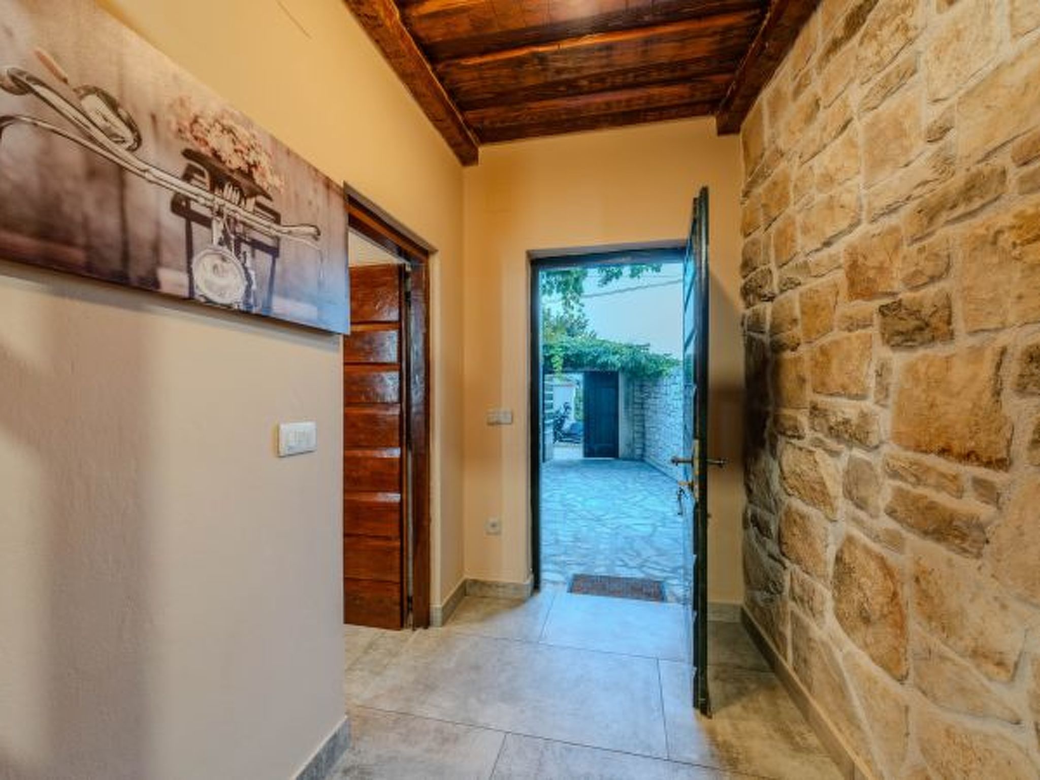 Photo of Stone Holiday house Zara with jacuzzi