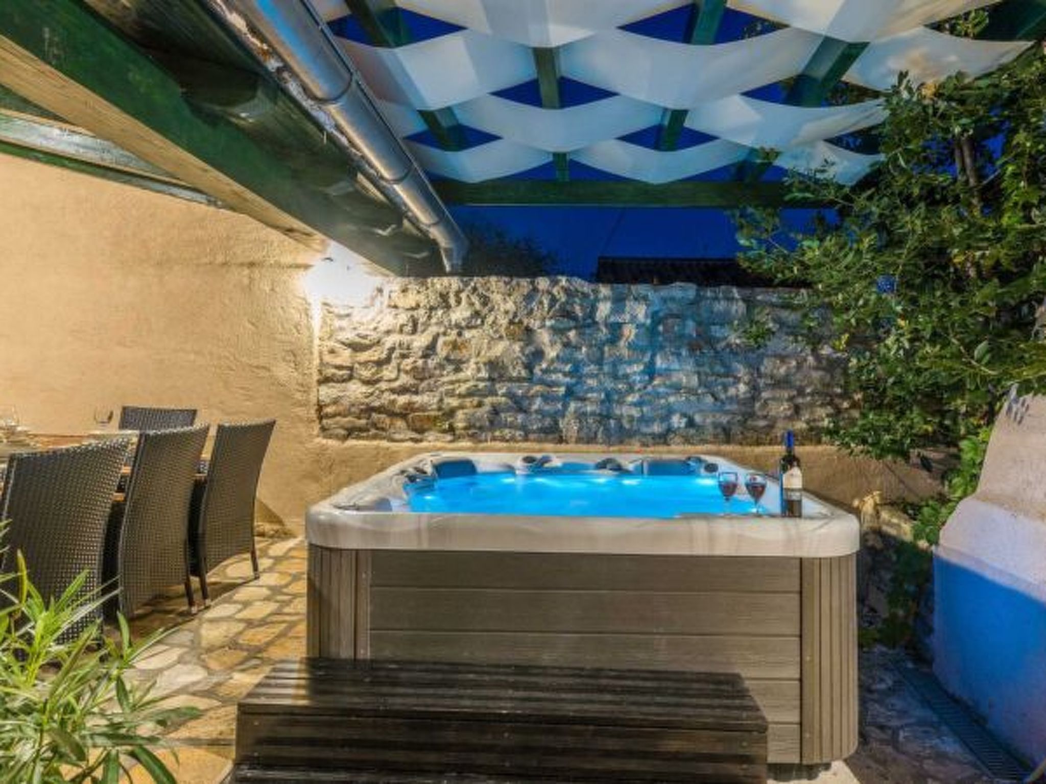 Photo of Stone Holiday house Zara with jacuzzi