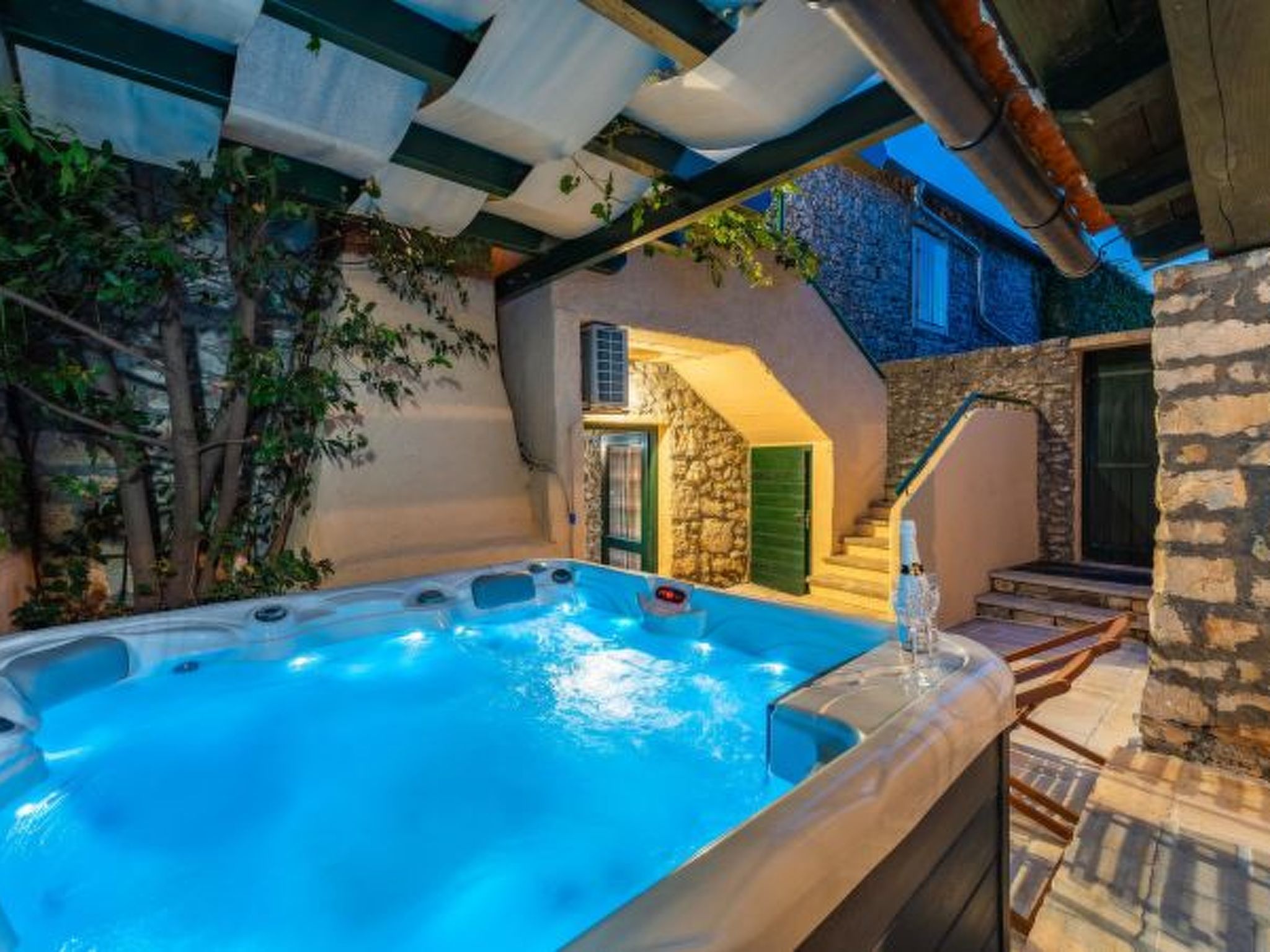 Photo of Stone Holiday house Zara with jacuzzi