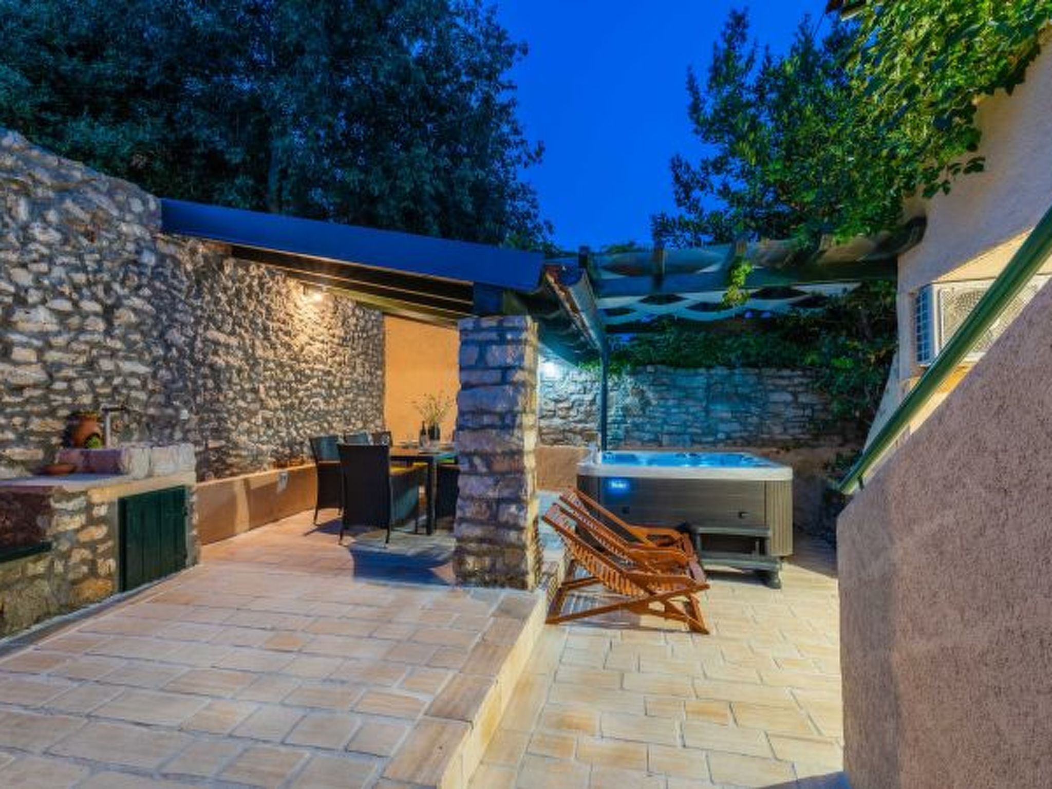 Photo of Stone Holiday house Zara with jacuzzi