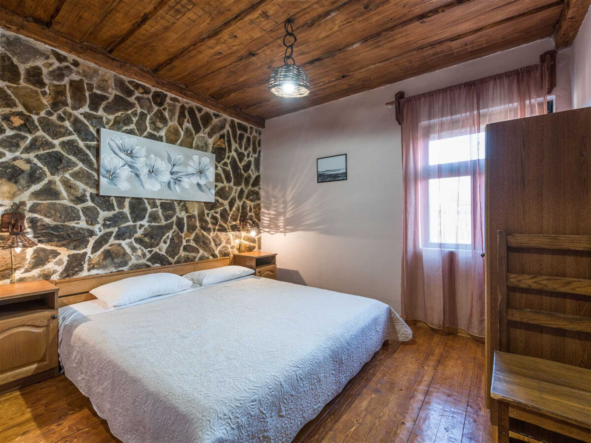 Photo of Stone Holiday house Zara with jacuzzi