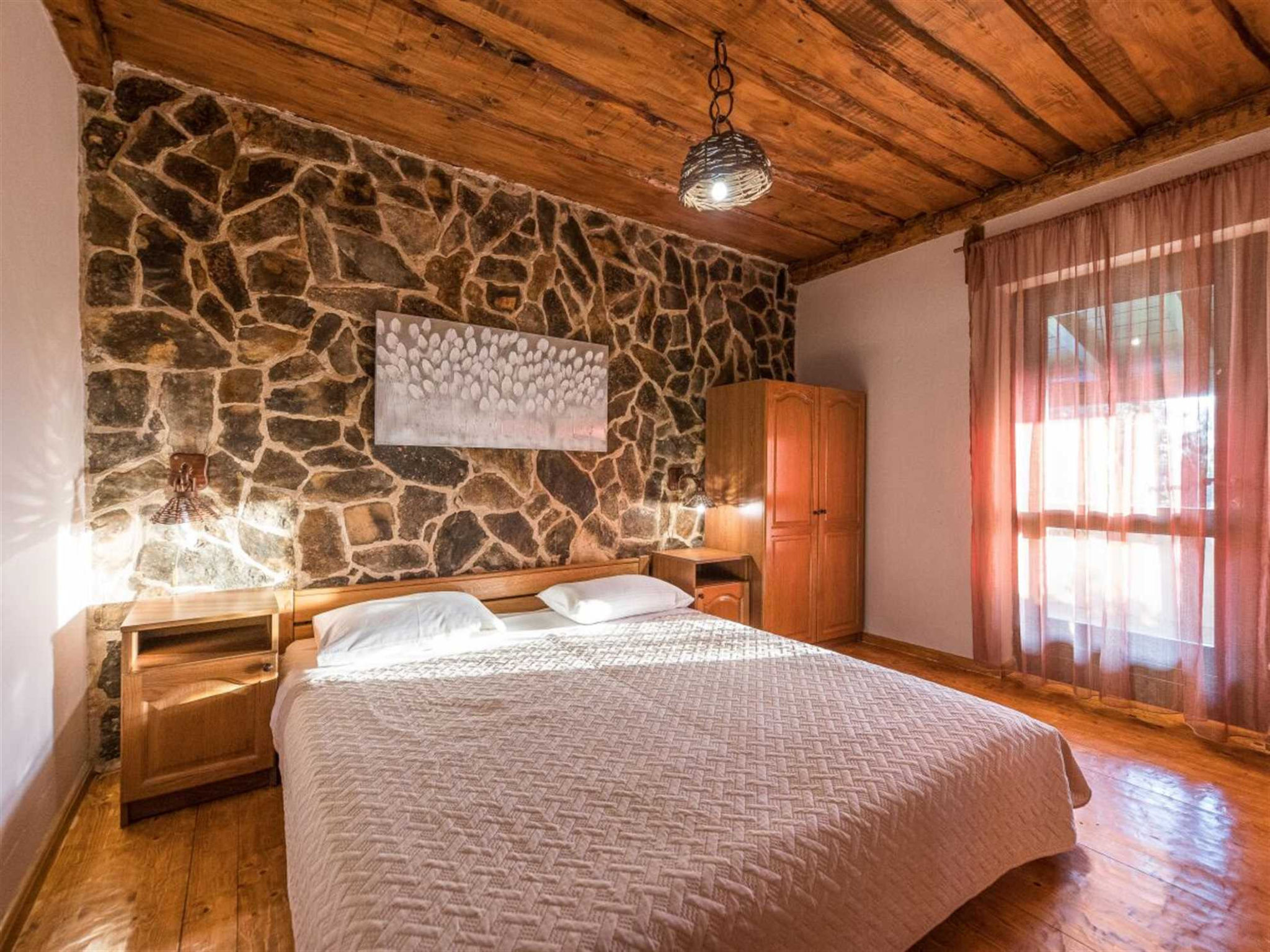 Photo of Stone Holiday house Zara with jacuzzi