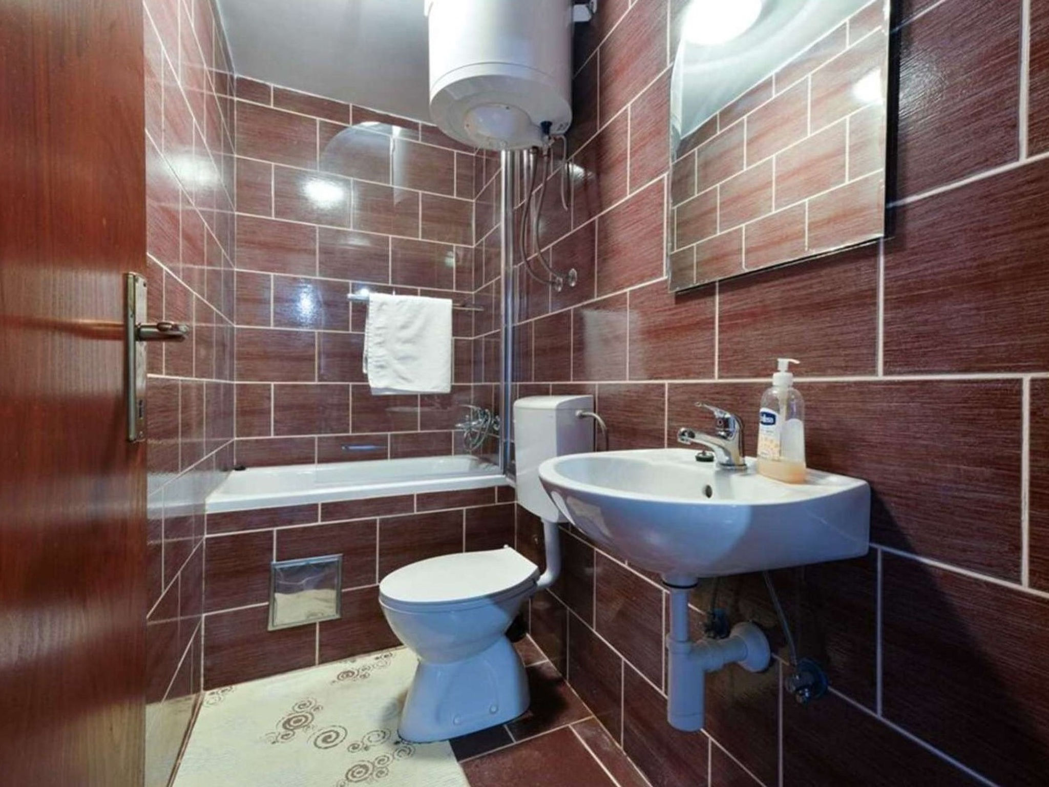 Photo of Stone Holiday house Zara with jacuzzi