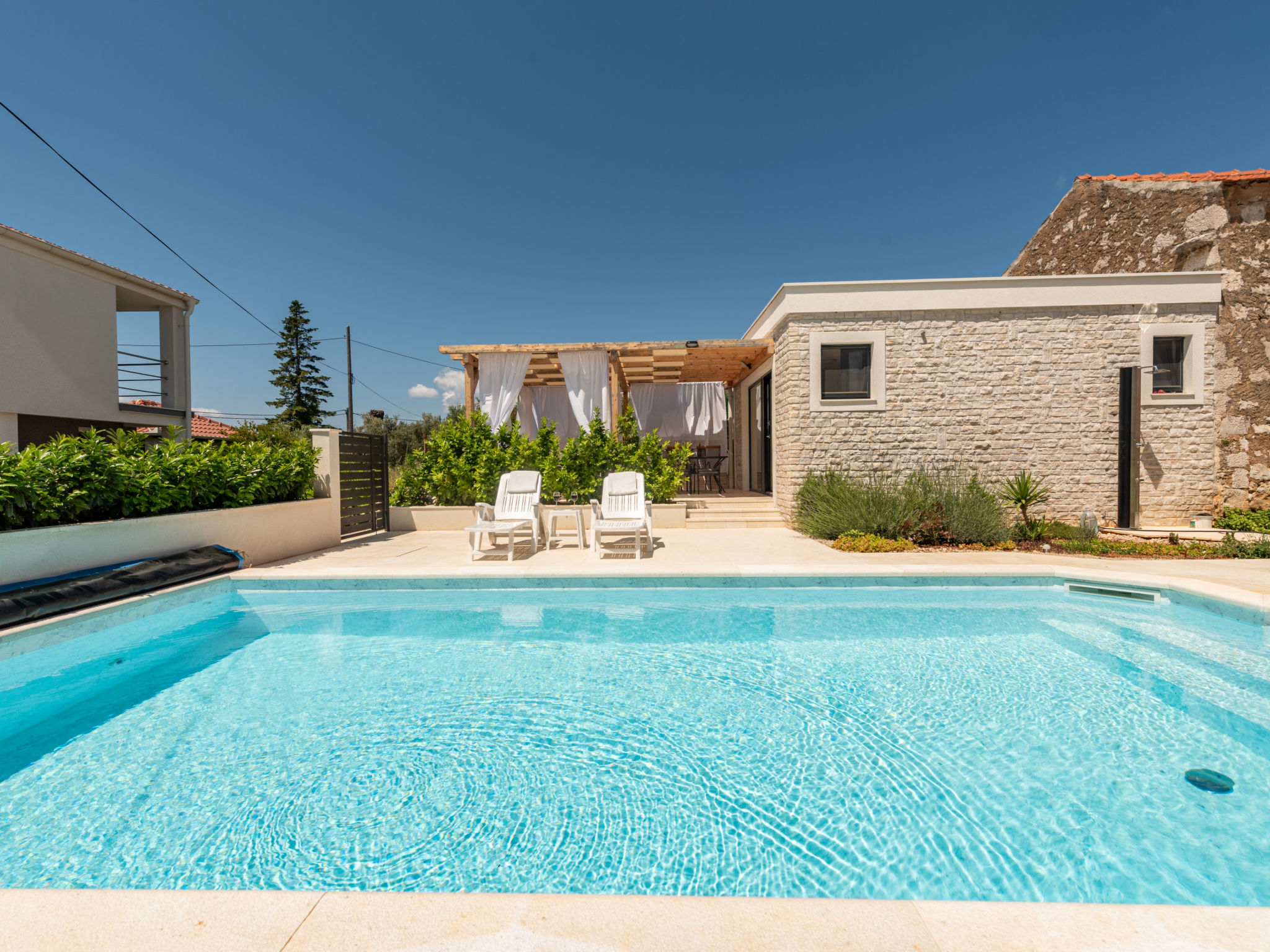 Studio Apartment Varos with shared pool