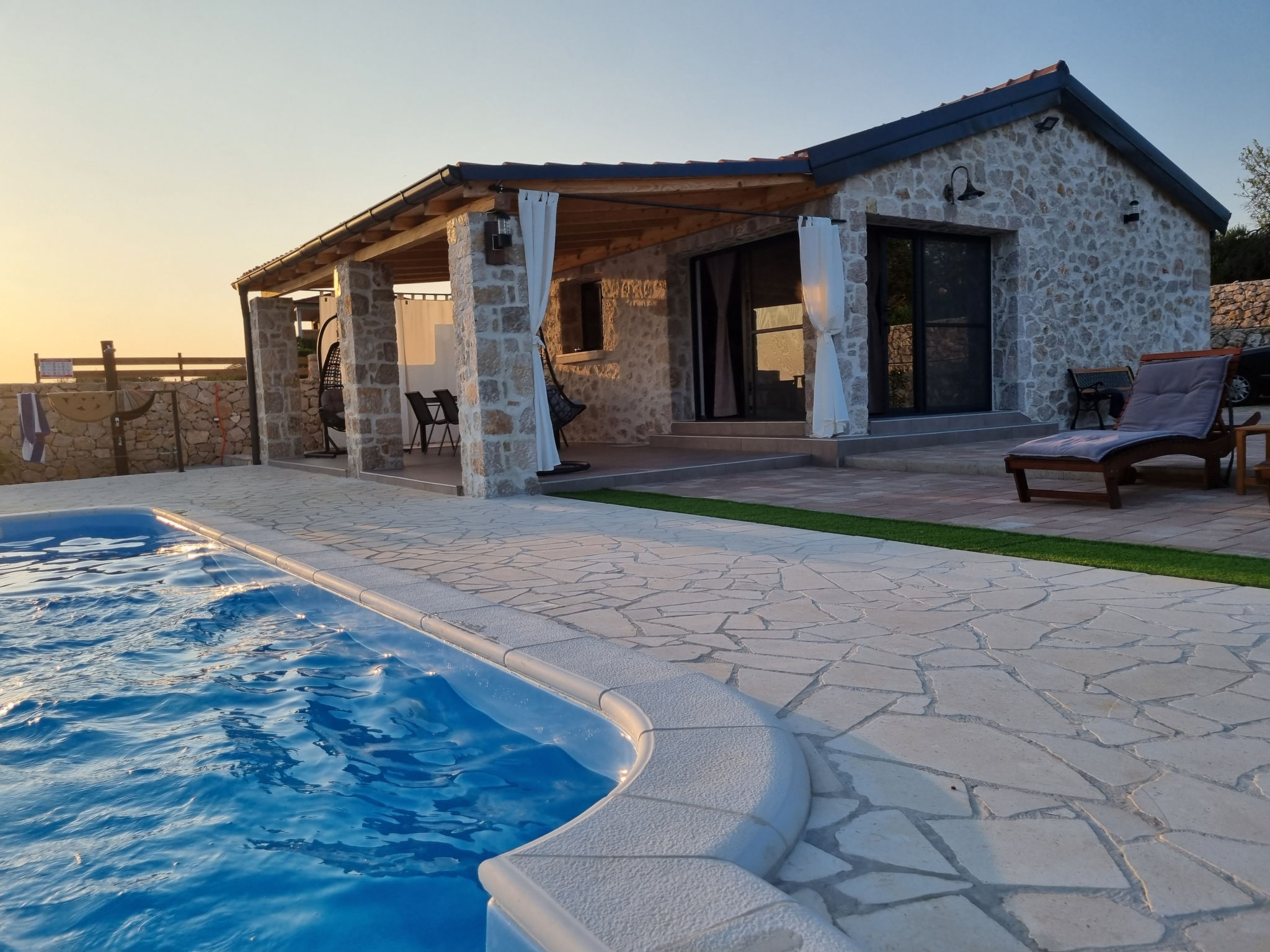 Holiday Home A&M with pool and lakeview - Binnen