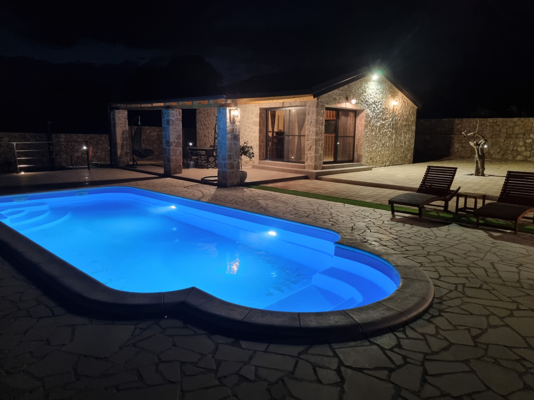Holiday Home A&M with pool and lakeview - Binnen