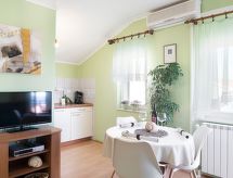 Appartement im Dachgeschoss mit Balkon