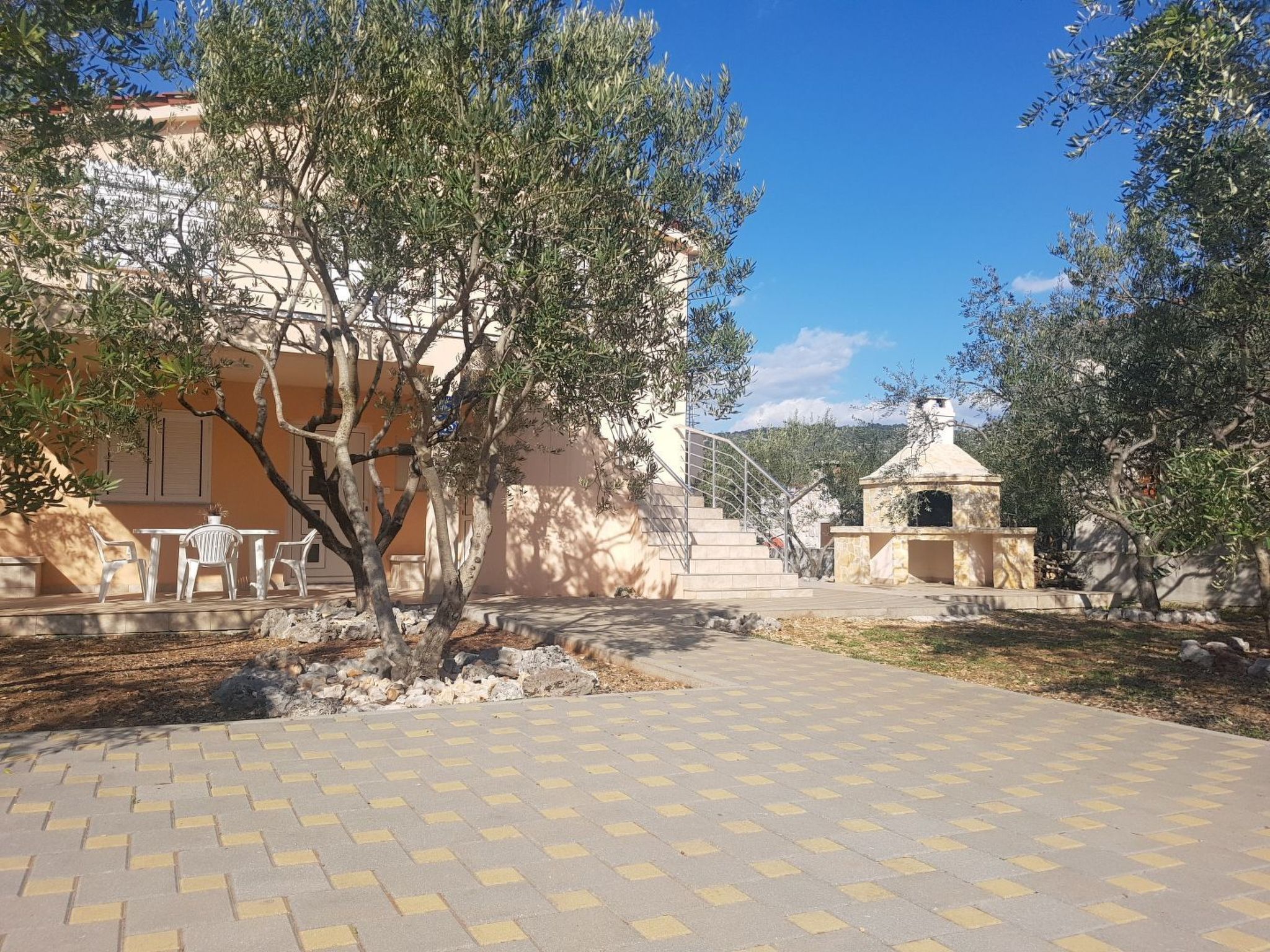 Discover the perfect escape for a large family or group of friends at our spacious holiday house in Sevid, Dalmatia. With room for up to ten guests, this house offers an ideal blend of comfort and con..