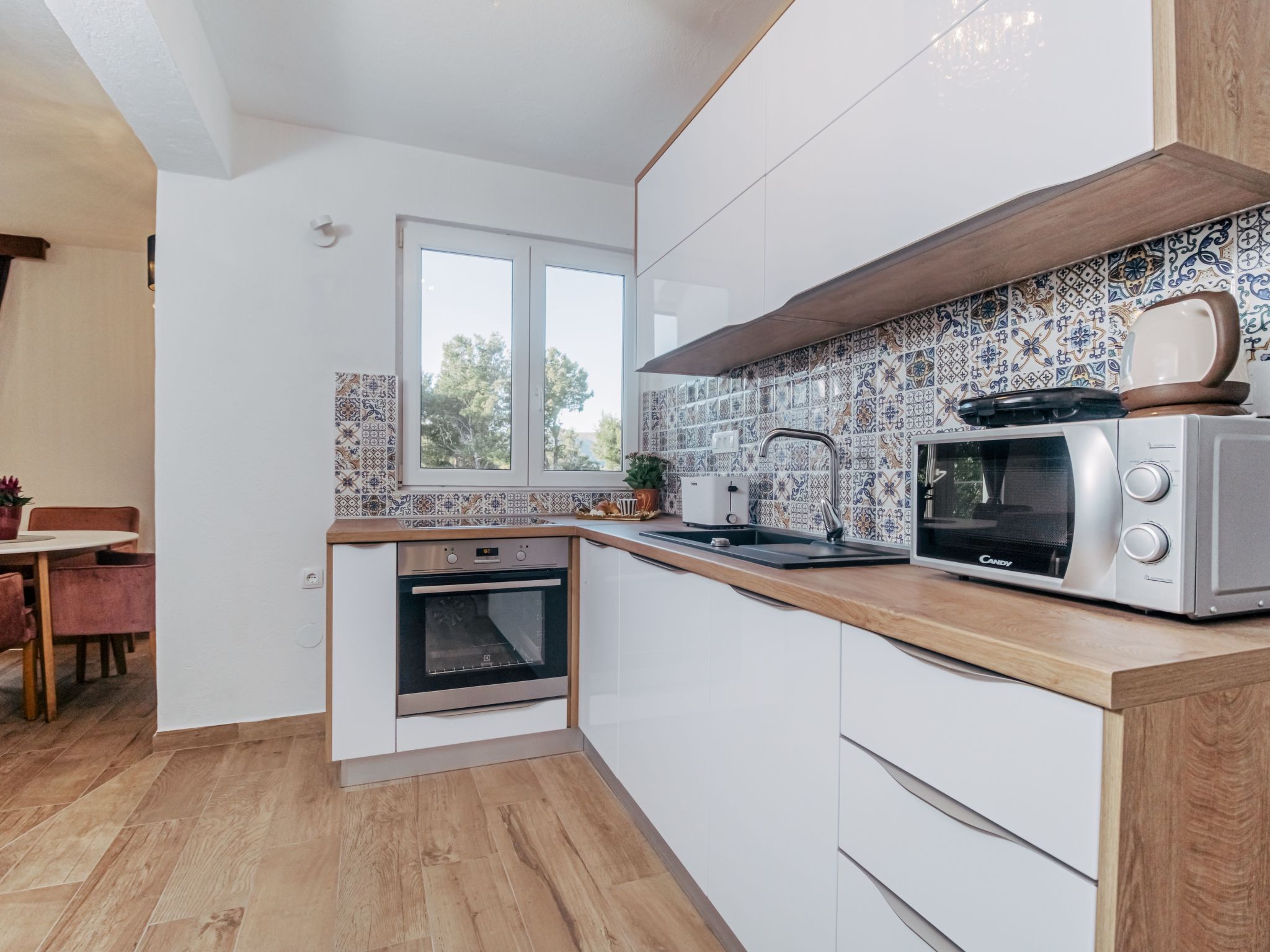 Wohnung "Esthera 6" mit Blick auf das Wasser-Drinnen