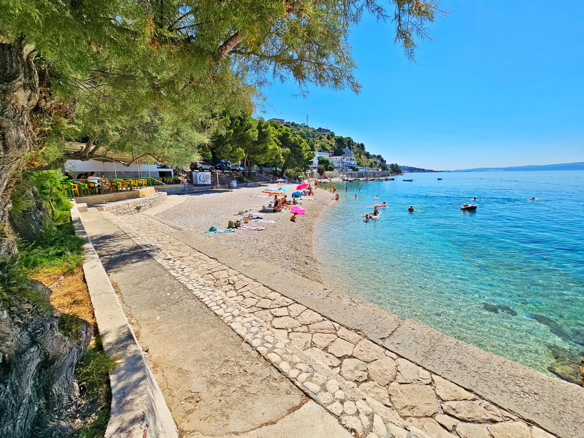 Mit überdachter Terrasse am Strand mit Meerblick-Draußen