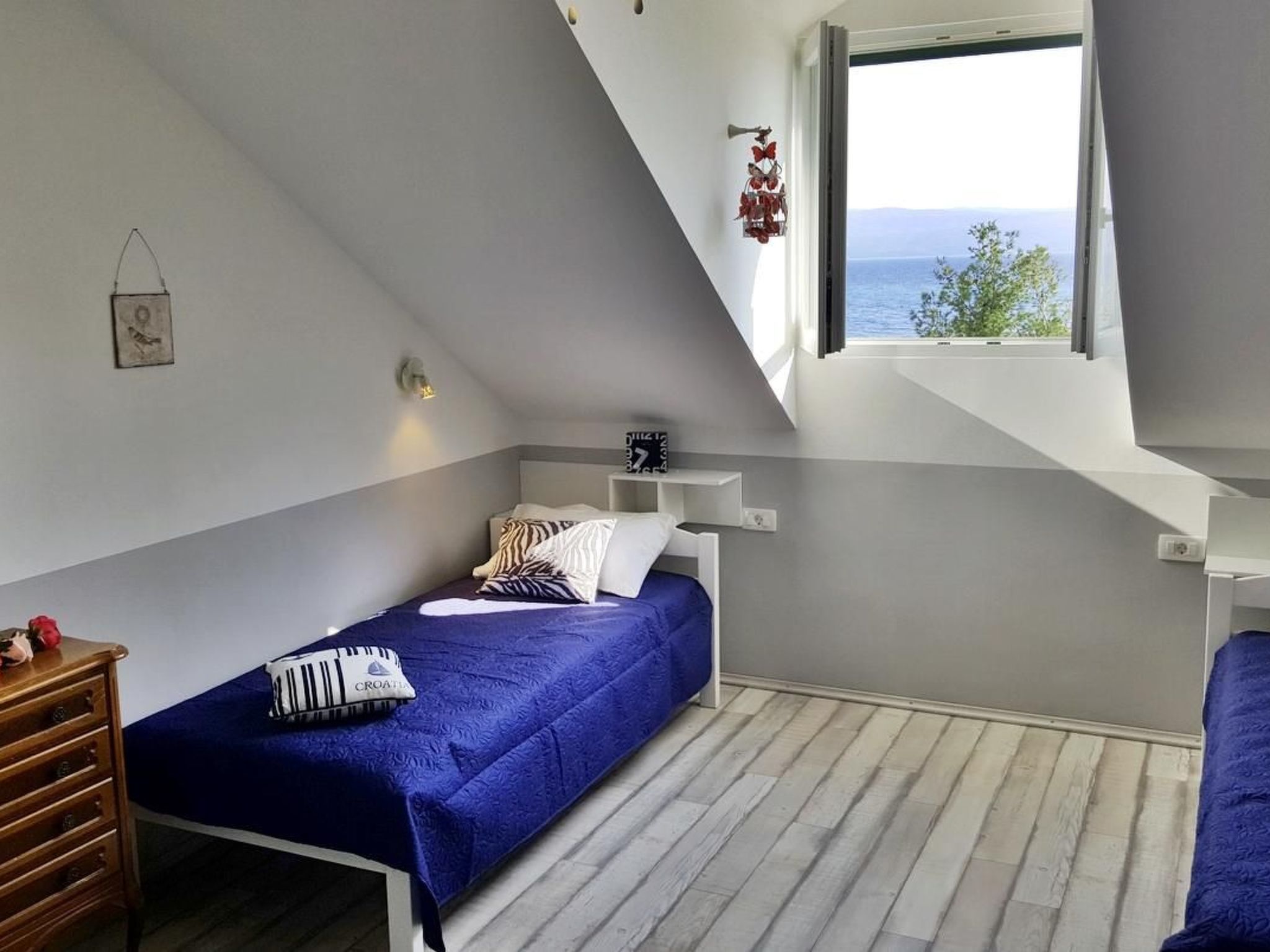 Mit überdachter Terrasse am Strand mit Meerblick-Drinnen