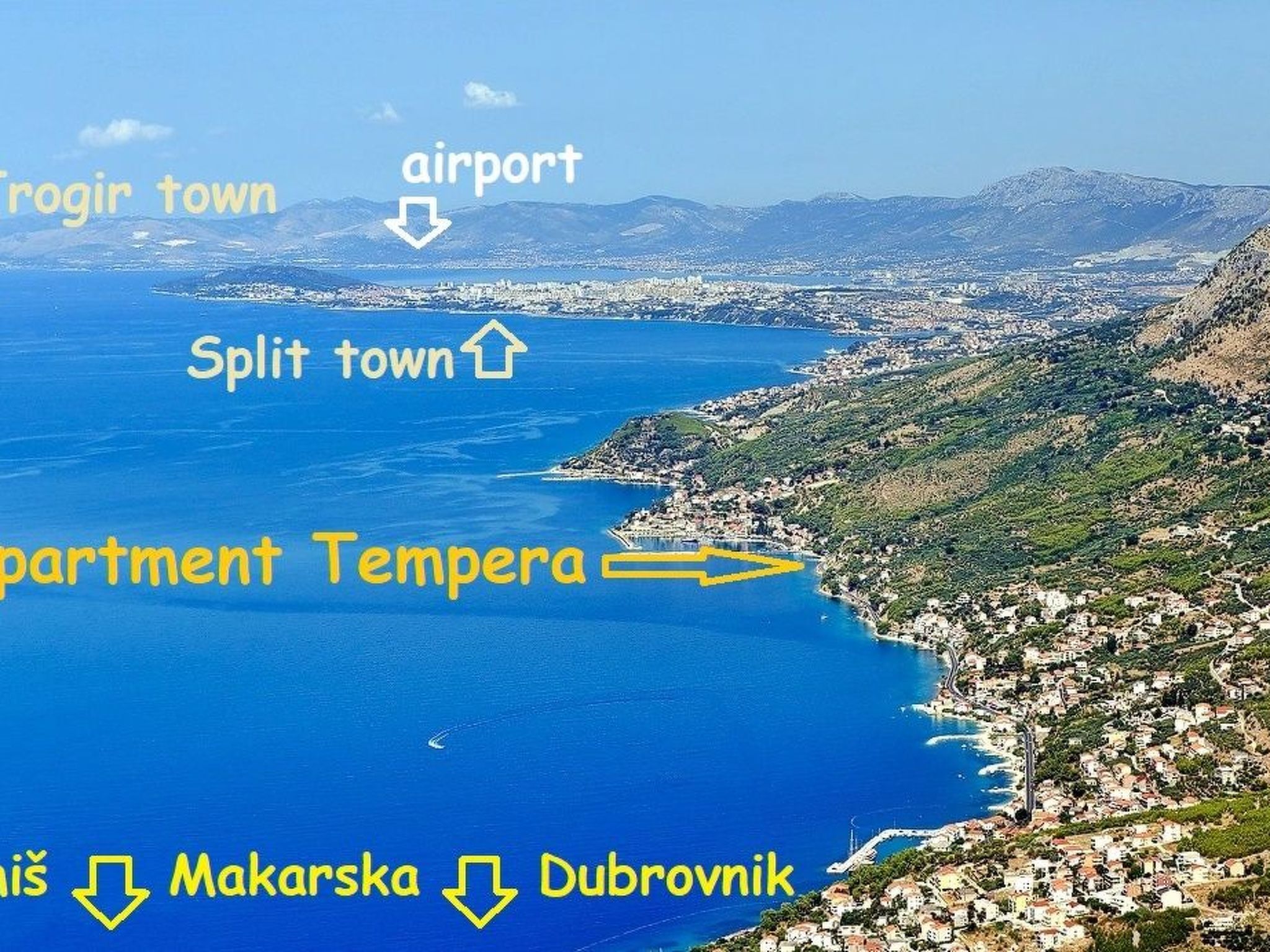 Mit überdachter Terrasse und Balkon am Strand mit Meerblick-Buiten
